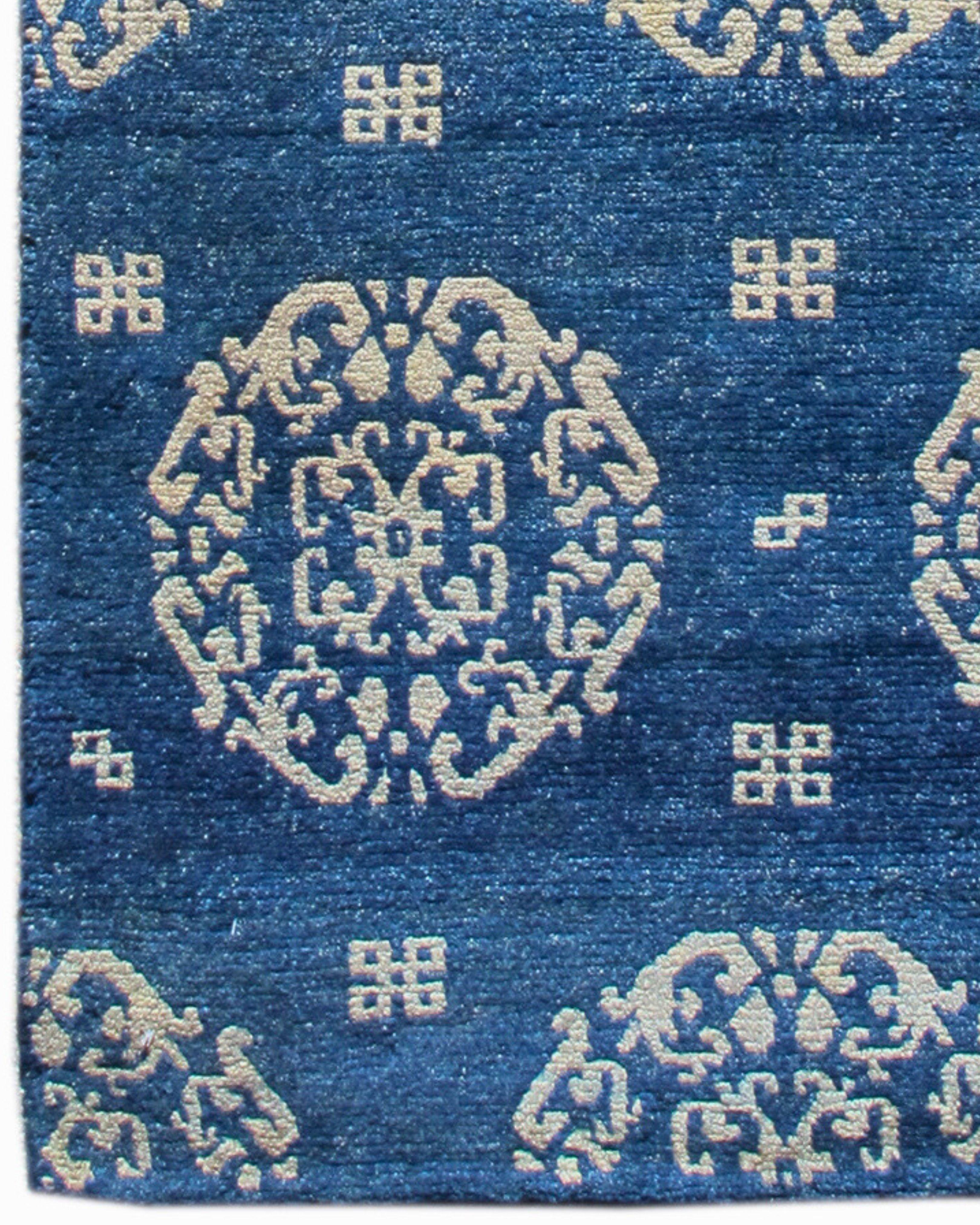 Wool Antique Blue-Indigo Tibetan Khaden Rug with Peonies, Late 19th Century For Sale