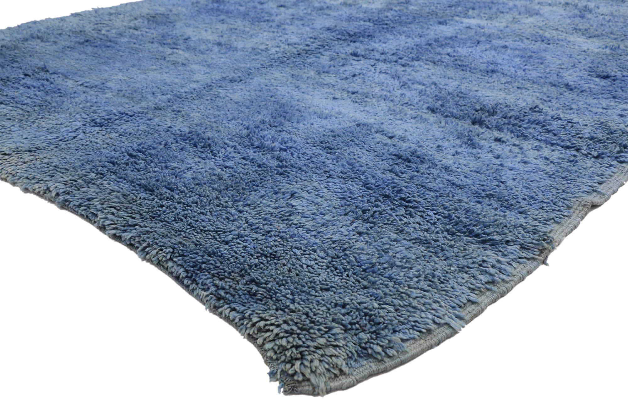 20854, blue indigo vintage Berber Moroccan rug with Postmodern Memphis style. Bold indigo blue combined with plush wool pile creates an endlessly fascinating effect in this hand knotted wool vintage Berber Moroccan rug. A solid indigo plane features