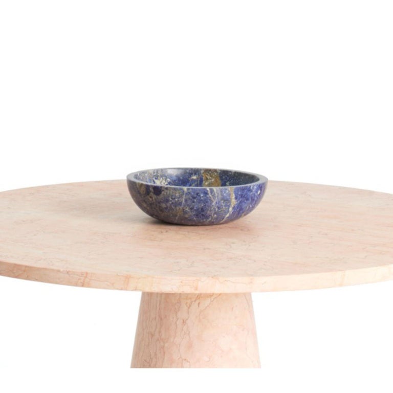 Blue inside out bowl by Karen Chekerdjian
Dimensions: 31 x 14 cm
Materials: Blue sodalite

Also available: Red, black, tobacco brown marbles

The value of change in a simple act. Karen Chekerdjian’s creation puts design front and centre: from