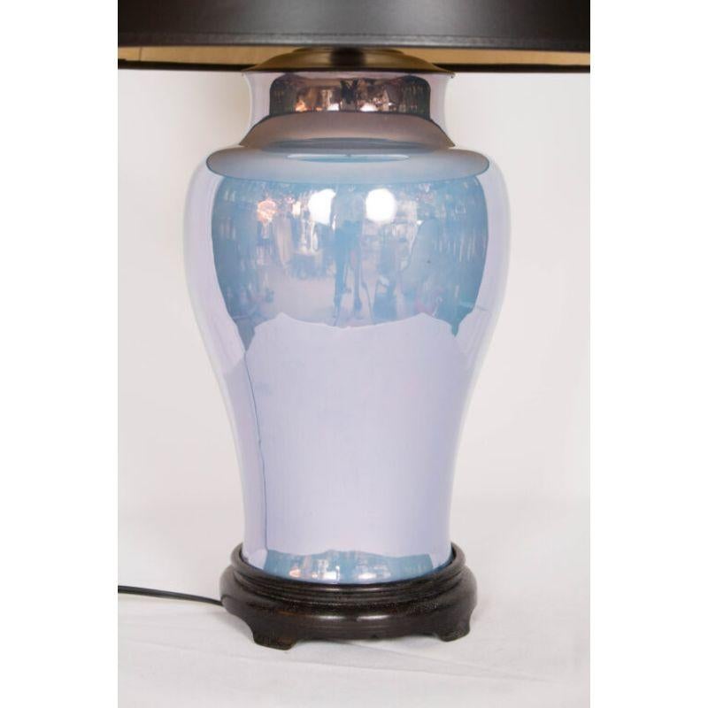Blue Irridescent table lamp. new wiring. Completely restored. American, C. 1940. Shown with shade sold separately: Black paper with gold lining, 12 x 17 x 10.5 $123

Dimensions: 
Height: 25? with shade, 18? to top of socket
Width: 8?.