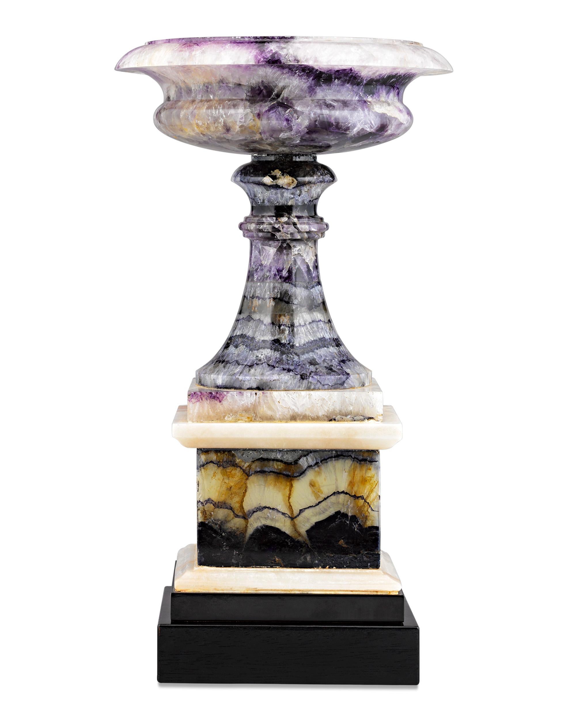 This highly important George IV tazza is crafted from a stunning example of Derbyshire Blue John, one of the rarest and most coveted minerals in the world. The hardstone is highly prized thanks to its natural patterns and striations, as well as its