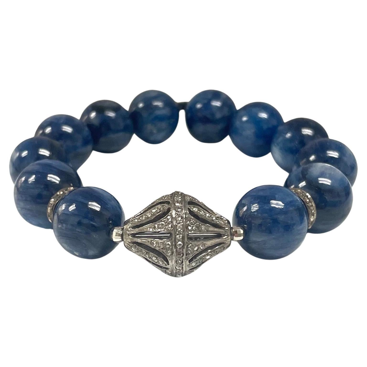 Description
Superior quality blue Kyanite stretchy bracelet, accented with a large 15x20 mm pave diamond centerpiece and rondelles. 
Item # B1101
Wear two together to make a statement, check out item# B1102, sold separately.
Also, see matching