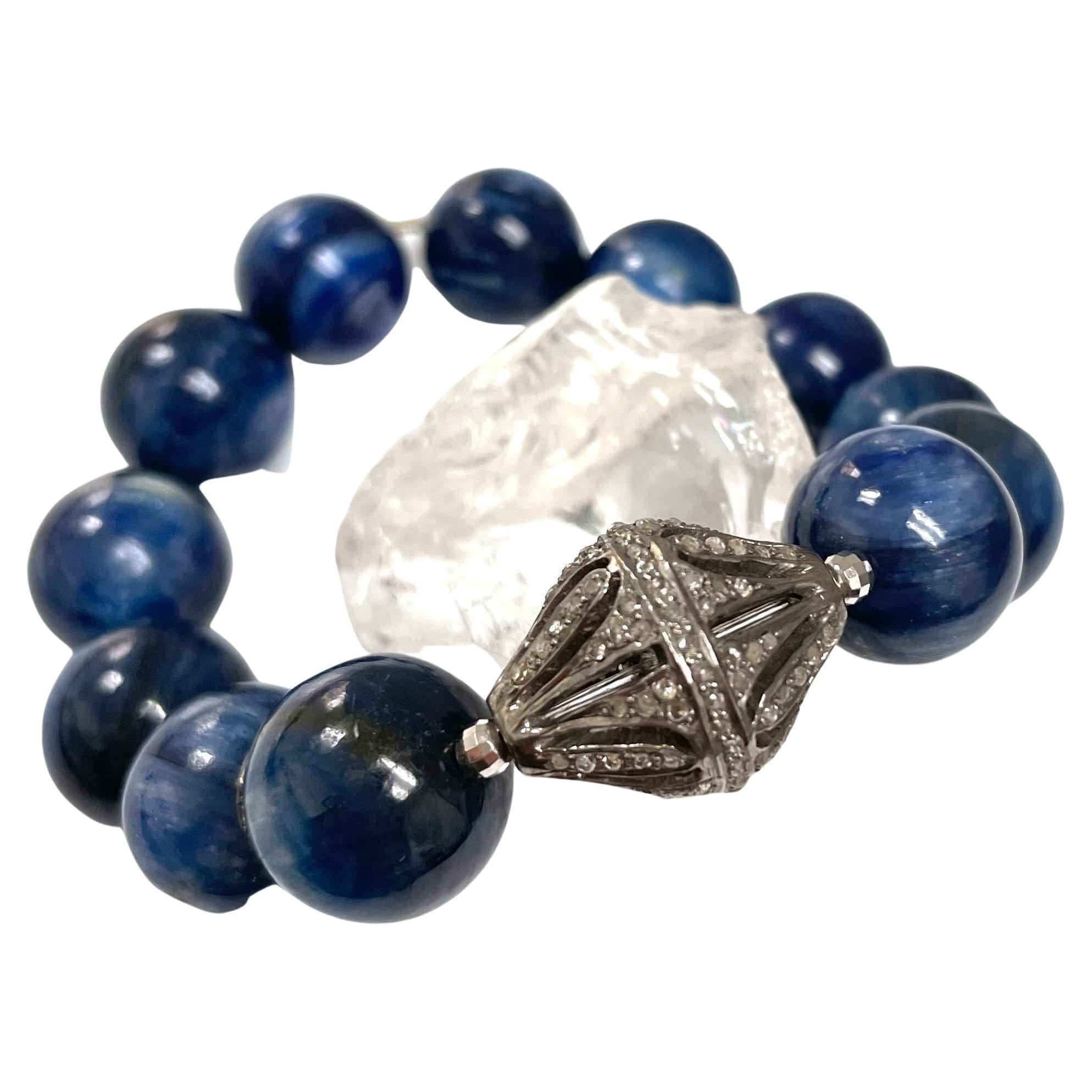 Description
Superior quality blue Kyanite stretchy bracelet, accented with a large 15x20 mm pave diamond centerpiece and rondelles. 
Item # B1102
Wear two together to make a statement, check out item# B1101, sold separately.
Also, see matching