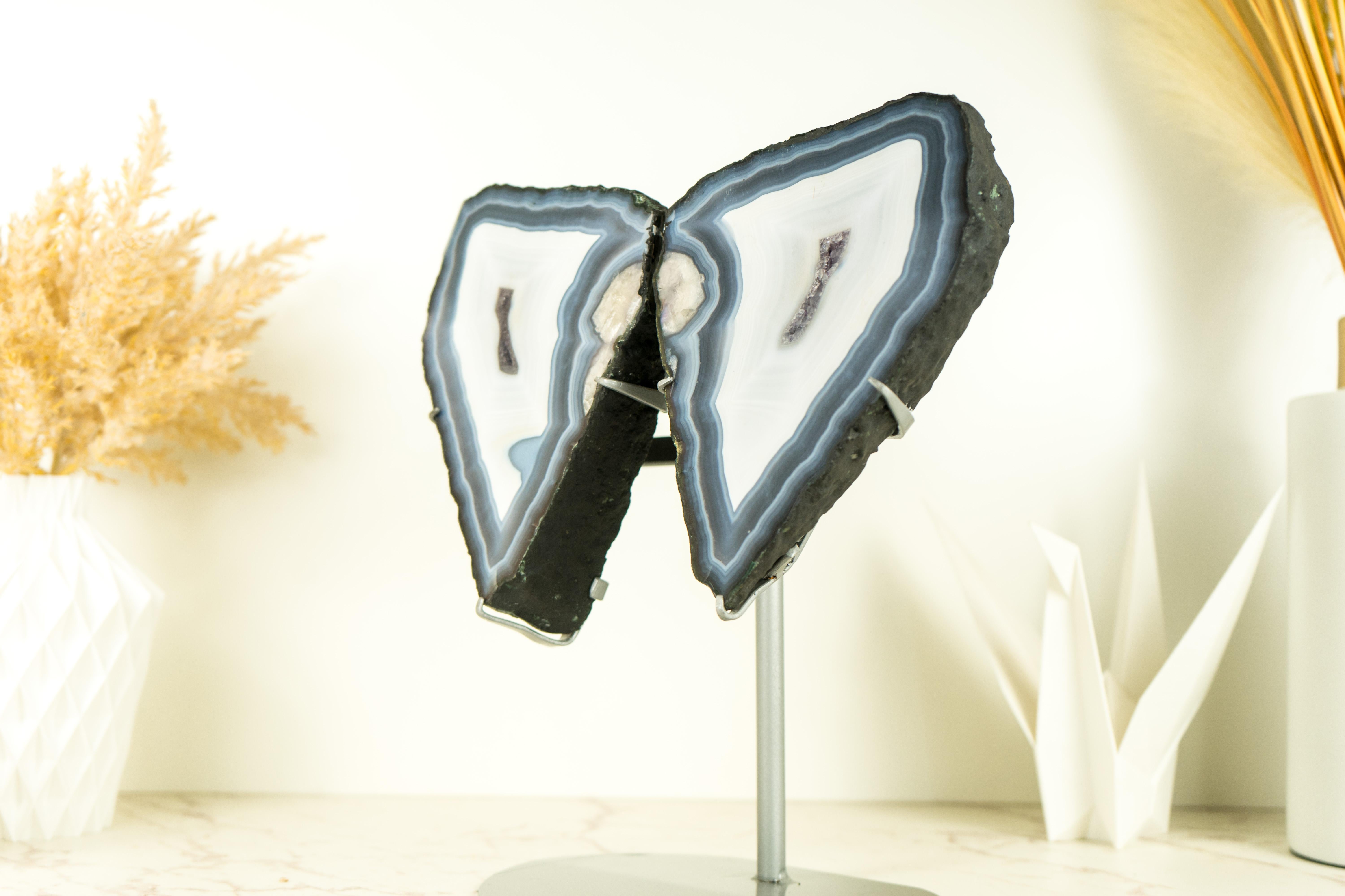 We were absolutely astounded when we first saw this exquisite agate specimen after cutting it. It transformed itself, from a geode into a world-class Agate Butterfly Wings Geode, resembling the delicate wings of an angel or butterfly. 

The Agate