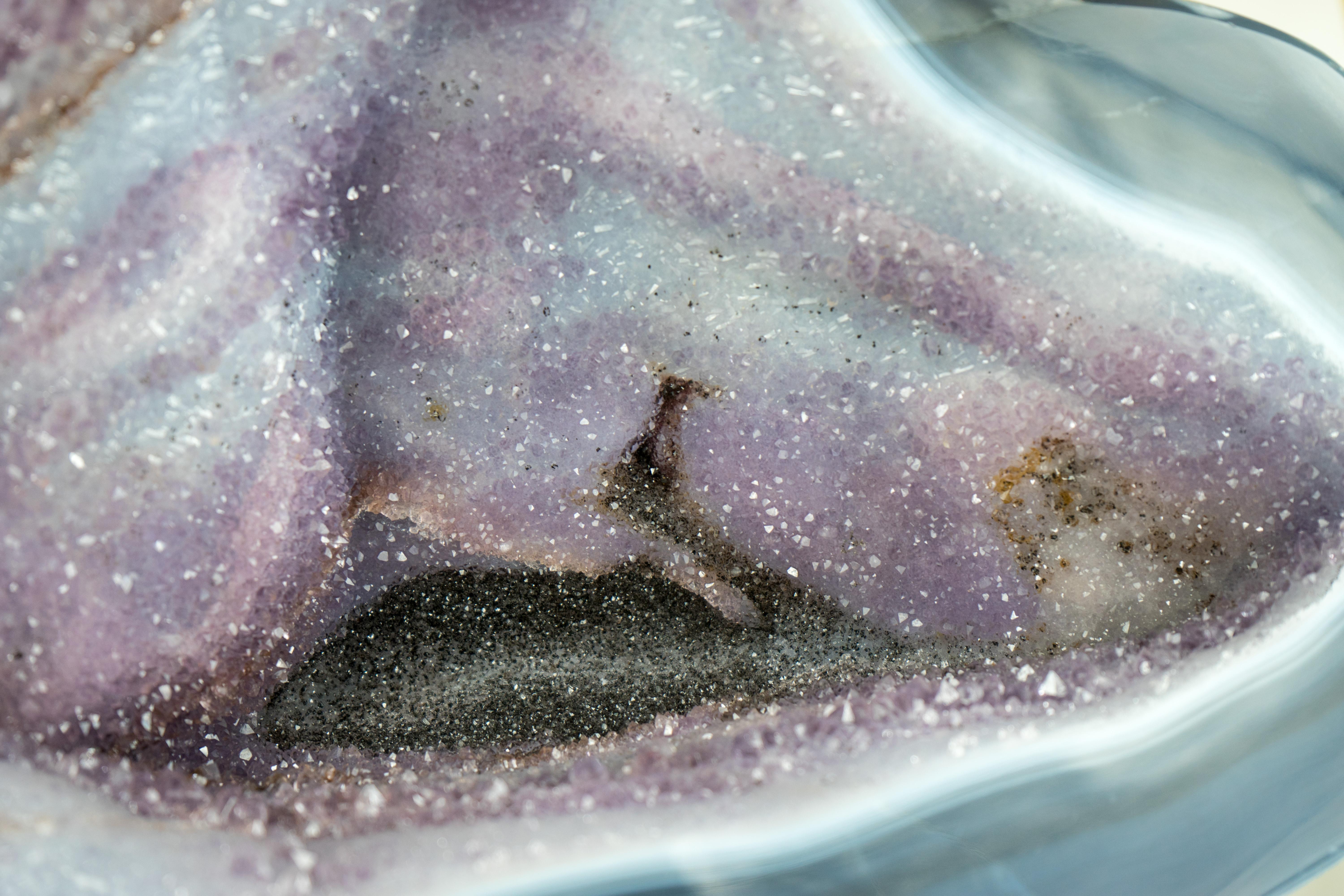 Spectacular Blue Lace Agate Geode with a Swan Drawing on Sparkly Druzy: A Natural Painting in the Form of a Geode

▫️ Description

A natural-geological artwork, this geode presents a painting of a delicate, swan-like figure swimming on sparkling