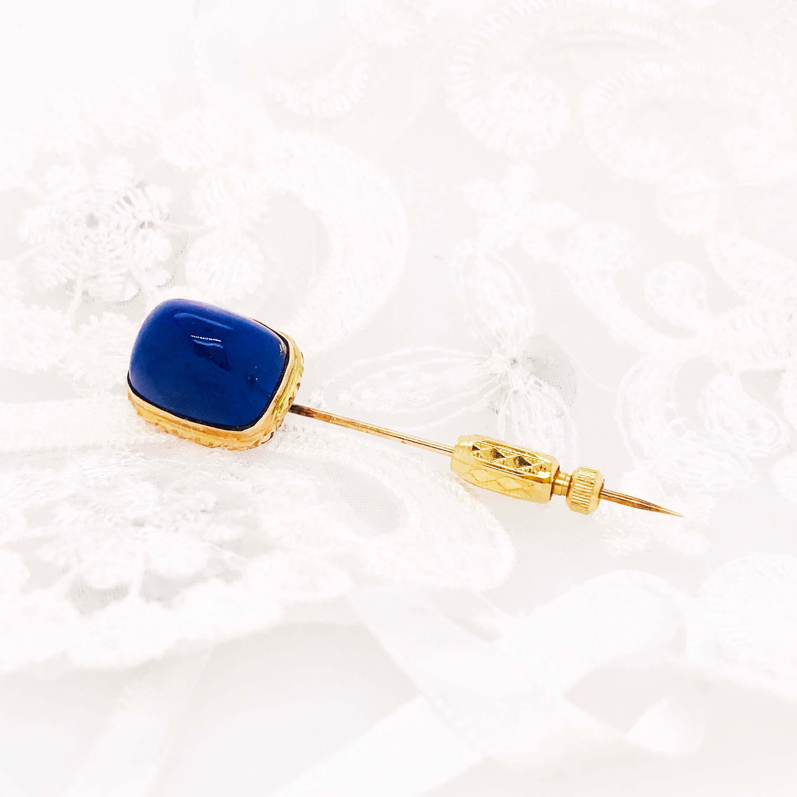 This gorgeous genuine blue lapis brooch is so bold and such a great accent to any piece! This modern, hand engraved design has been made in 18k yellow gold with a genuine blue lapis piece set on the top. 
The blue lapis gemstone is a cushion shaped,