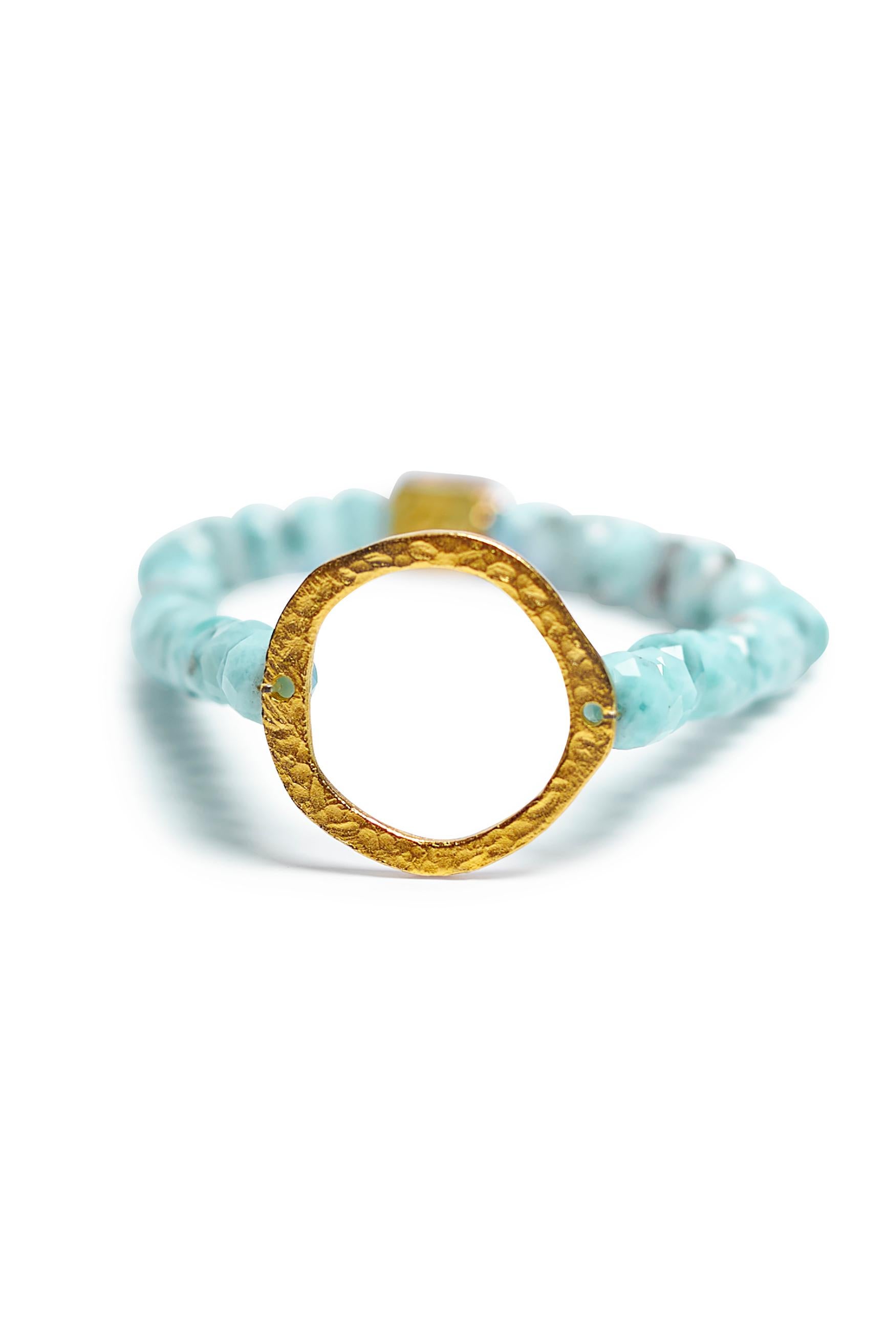 Behind the Jewelry
The 14K gold circle represents timelessness.  There is no beginning or end, it represents infinite life and love.  The bracelet is adorned with a customer favorite; Larimar, which is a stone that embodies the tranquility of the