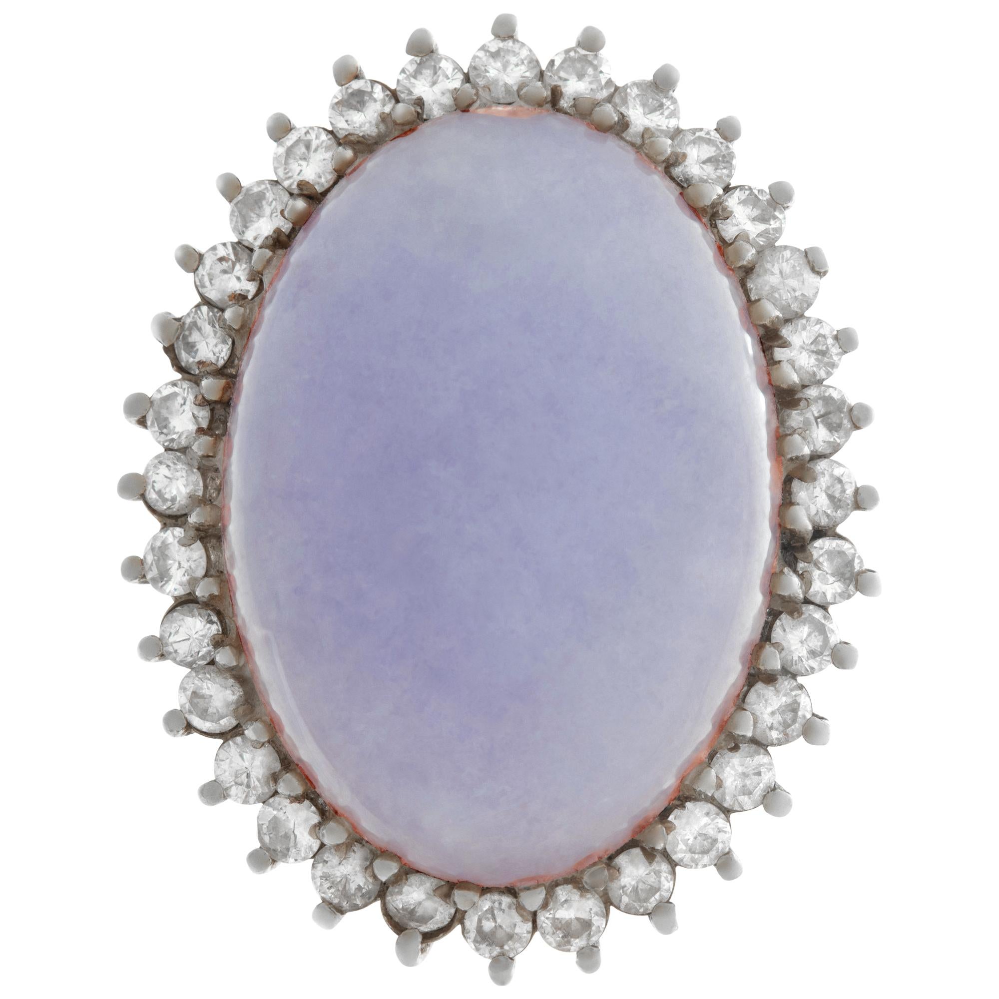 Blue lavender oval chalcedony ring with approximate 0.75 carat diamond frame set in 14k white gold. Size 6.5, head measures 25mm x 20mm, shank measues 3mm.This ring is currently size 6.5 and some items can be sized up or down, please ask! It weighs