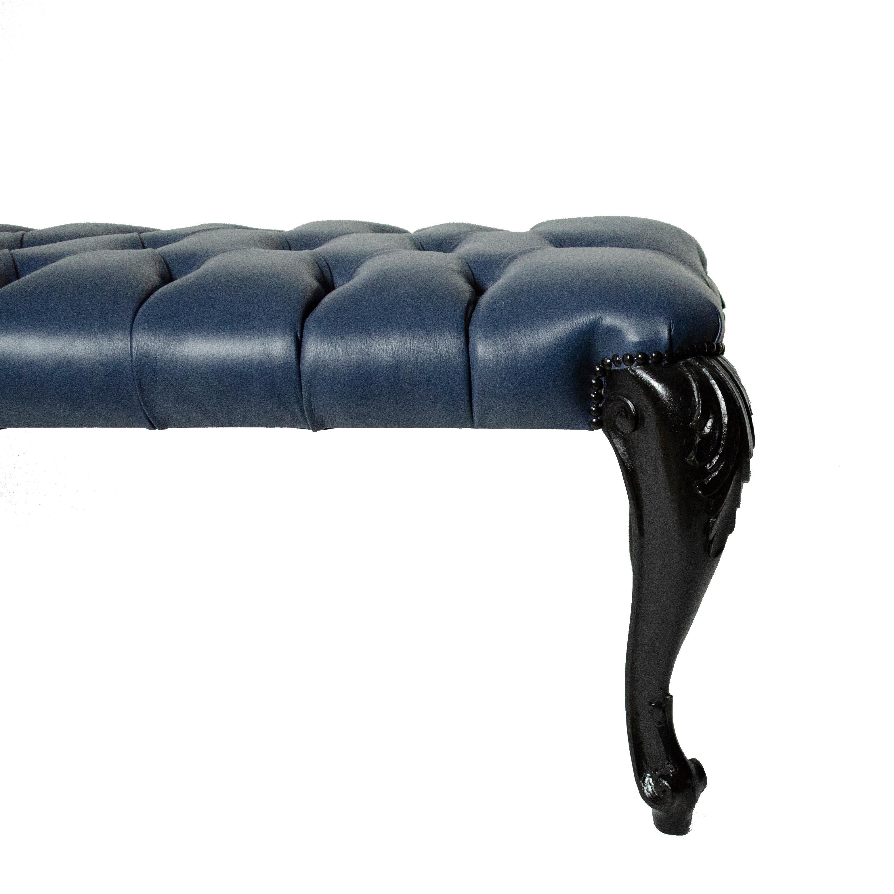 Blue leather reupholstered long bench with black ebonite and engraved legs.
How to set in a room, this kind of bench is perfect at the end of a bed, along a corridor, in an entrance, to complete seats in a living room. 






 