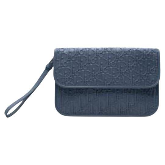 Blue leather Oblique embossed clutch bag For Sale