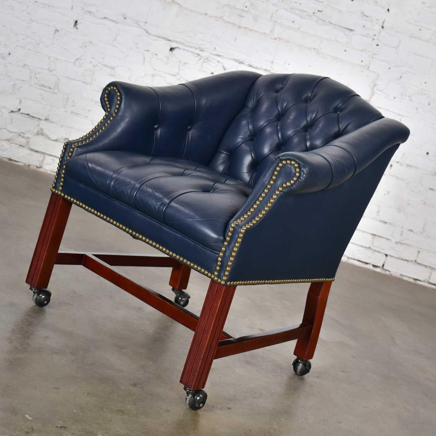 Blue Leather Rolling Captain’s Chair Campaign Chippendale Style In Good Condition In Topeka, KS