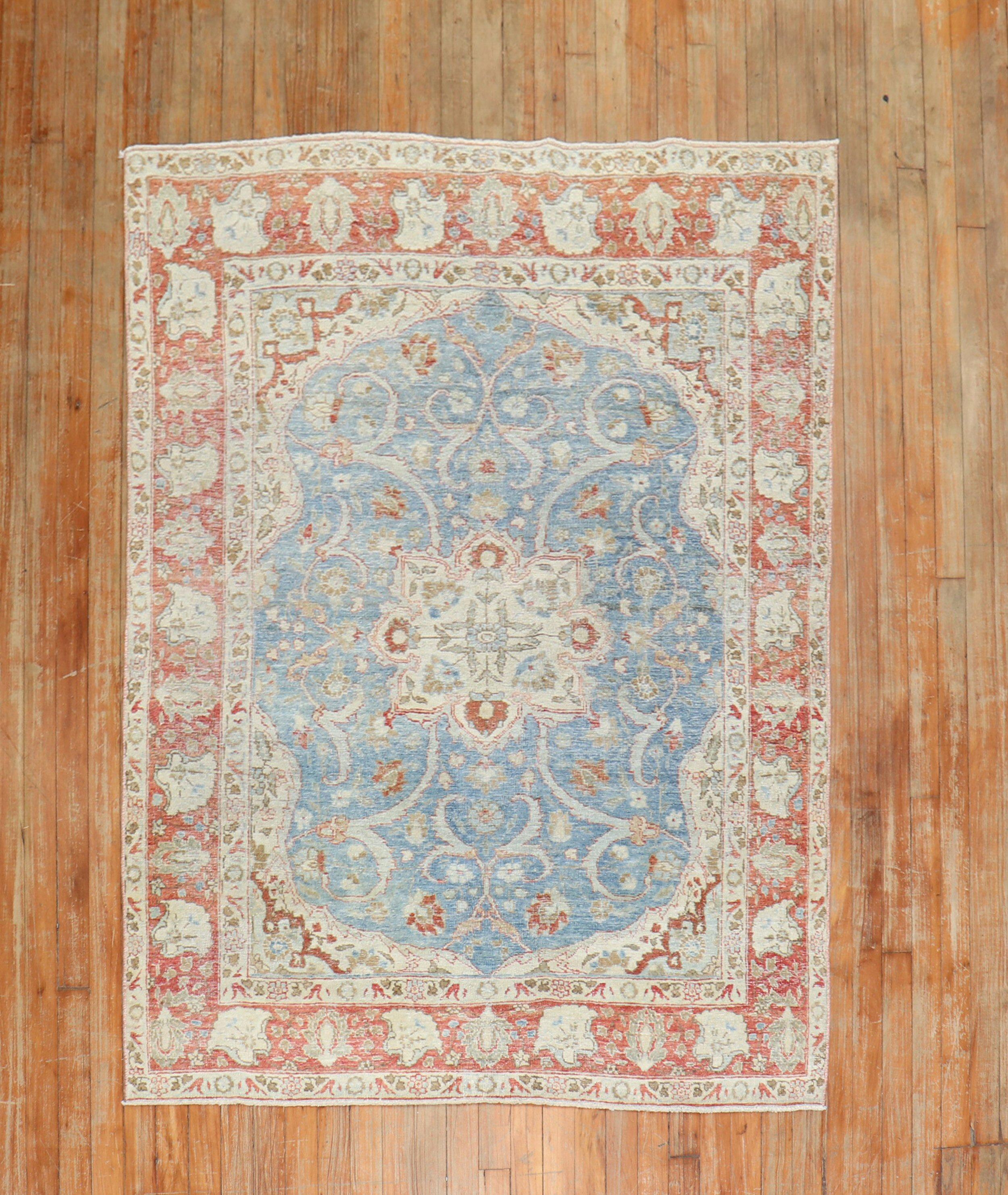 1930s Persian Tabriz Rug in soft blues and soft red

Measures: 4'6'' x 6'2''.

