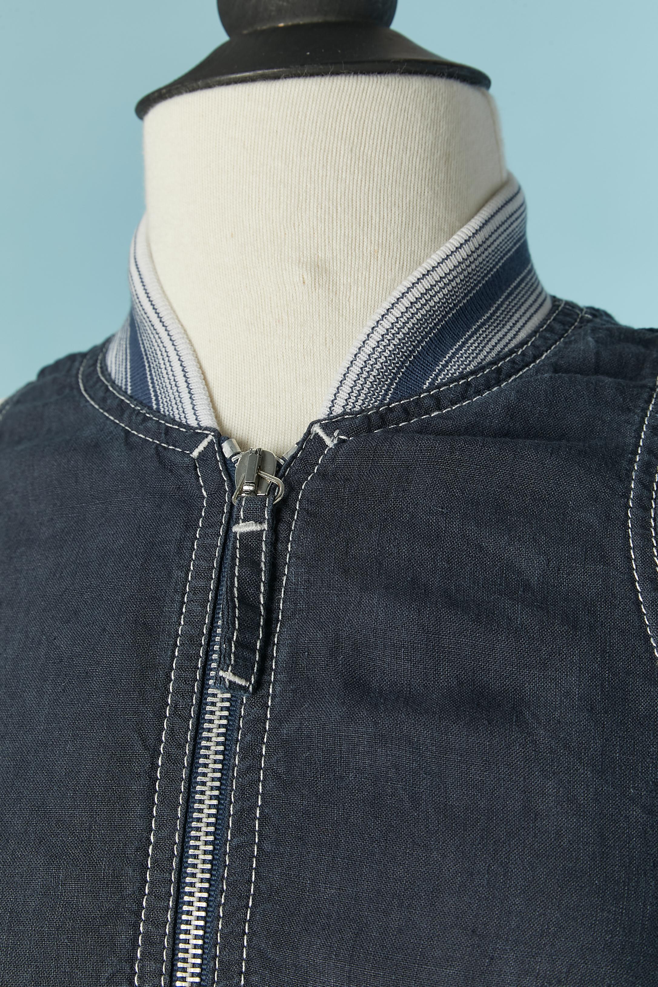 Blue linen dress with striped inset rib. Zip closure on the middle front/
SIZE 40 (It) 6 (US) M 