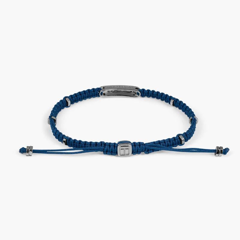 Blue Macramé Bracelet with Black Rhodium Baton, Size S

The engravable sterling silver bar is set in black rhodium with black sterling silver disc elements added around the bracelet to give little flashes of light throughout the design. Our