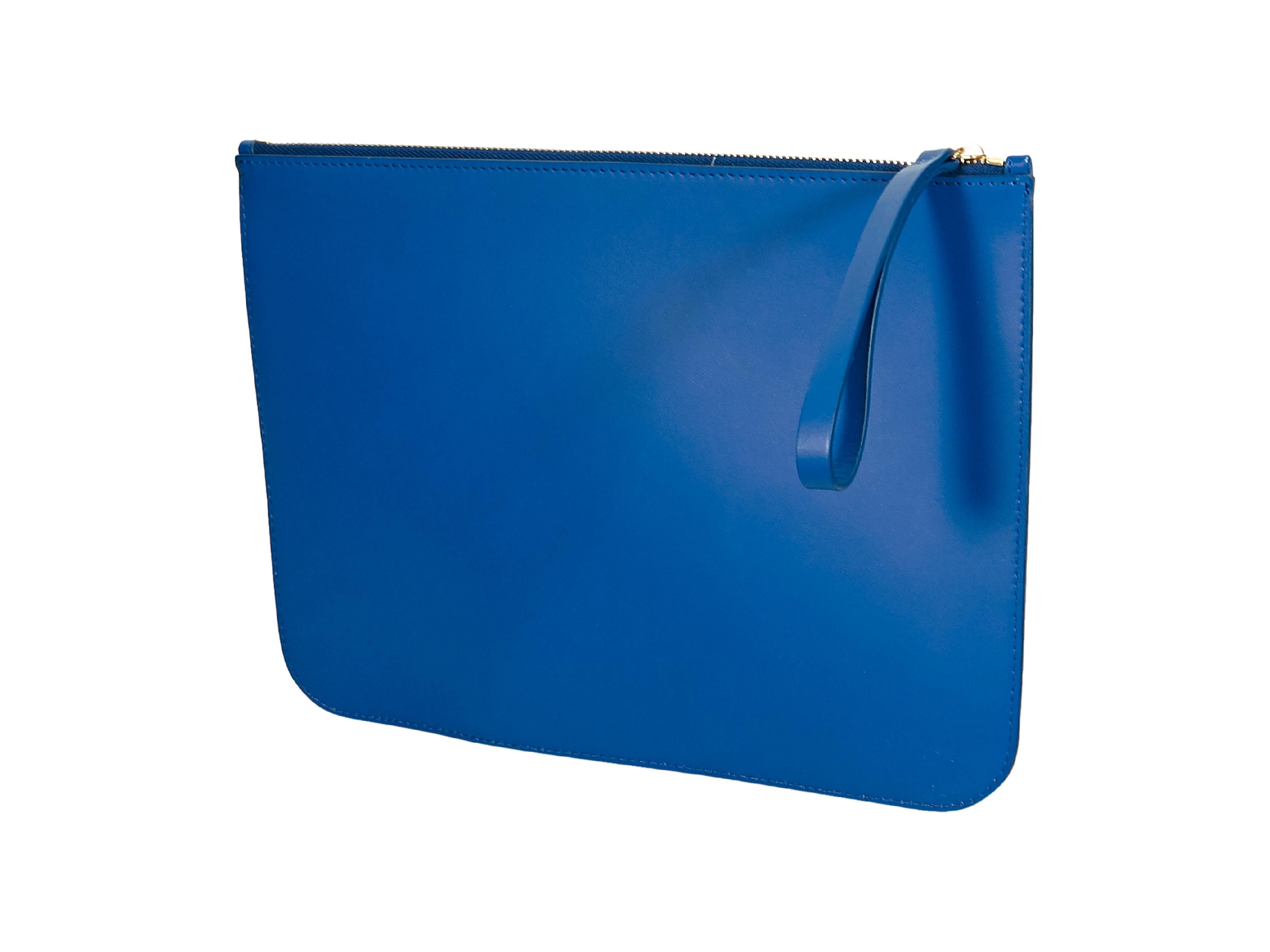 Product details:  Blue leather pouch by Mansur Gavriel.  Top zip closure.  Goldtone hardware.  11.5
