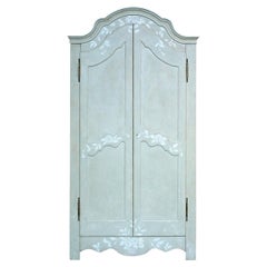 Blue Mantegna Armoire with Textural White Flowers