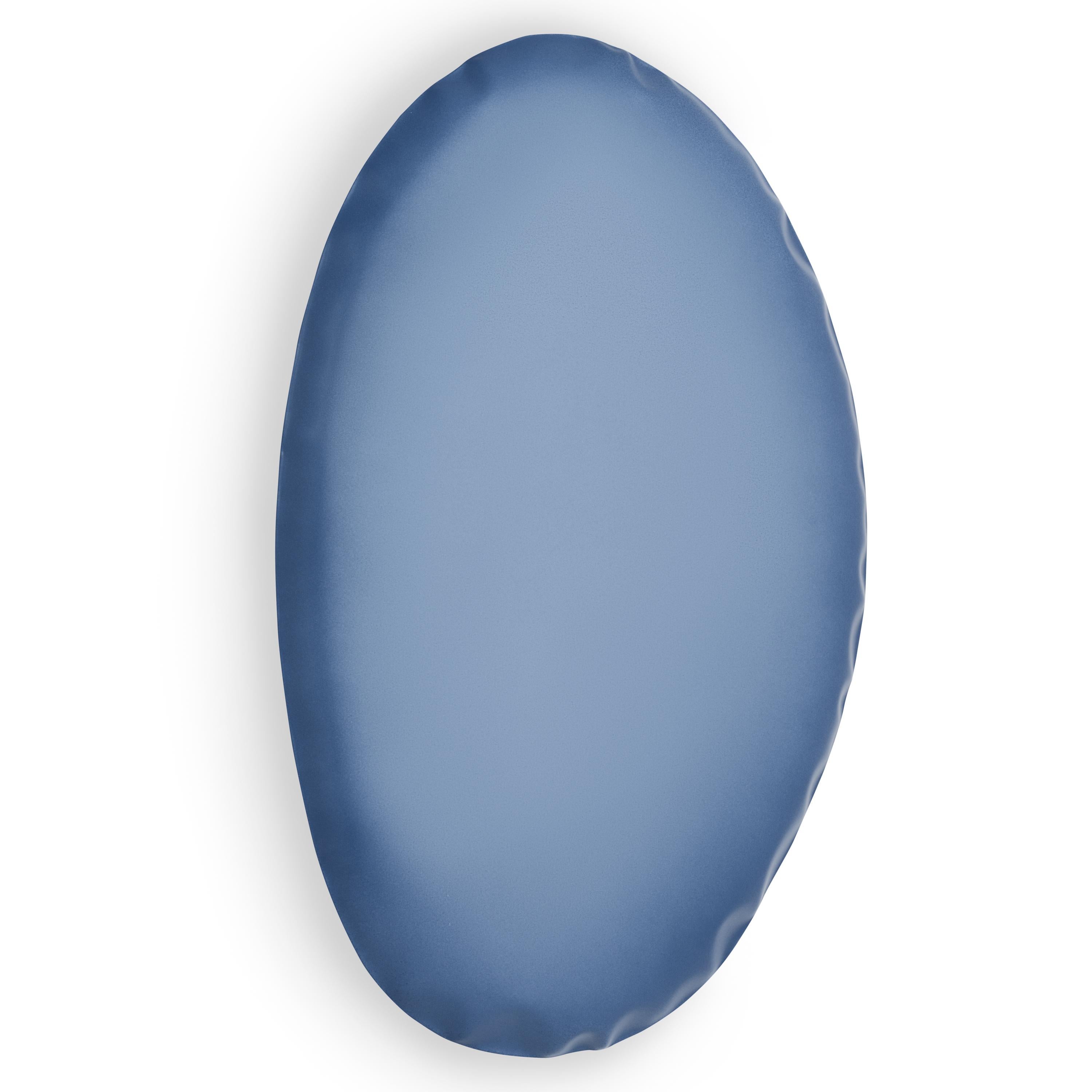Blue Matt Tafla O5 Wall Mirror by Zieta
Dimensions: D6 x W40 x H60 cm 
Material: steel
Available finishes: Also available in other sizes and colours.Please contact us.

Soft steel impressions
Challenging the material is one of the fundamental