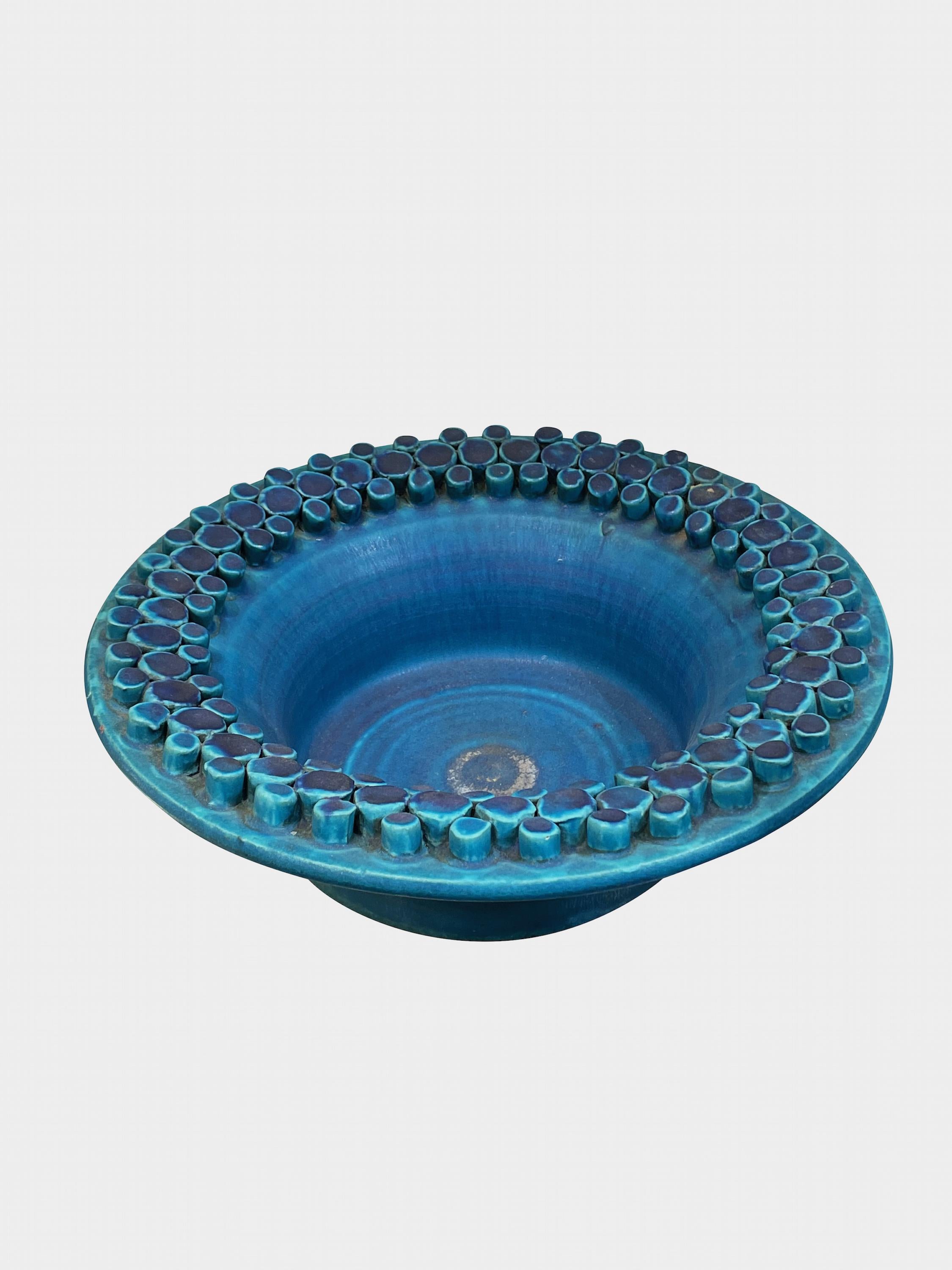 Mid Century French matte blue glazed footed bowl with
raised decorative pattern border.
ARRIVING AUGUST