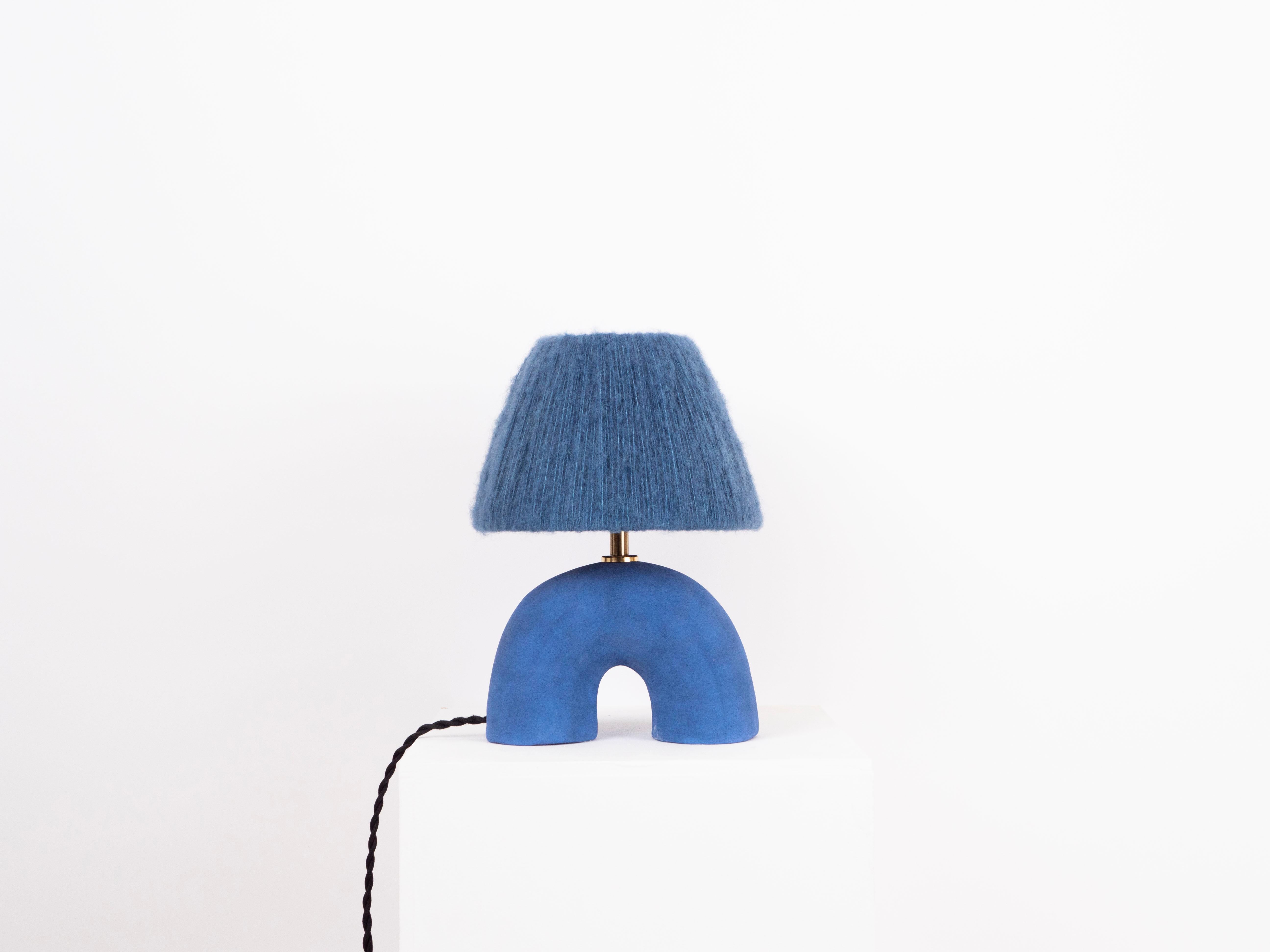 Blue matte finish lamp with mohair shade

Estimated processing time is 2 weeks from order confirmation

Pictured with a Mini Globe LED E27 Bulb. Bulb not included

To pair this base with a shade in an alternative colour or Material, click the