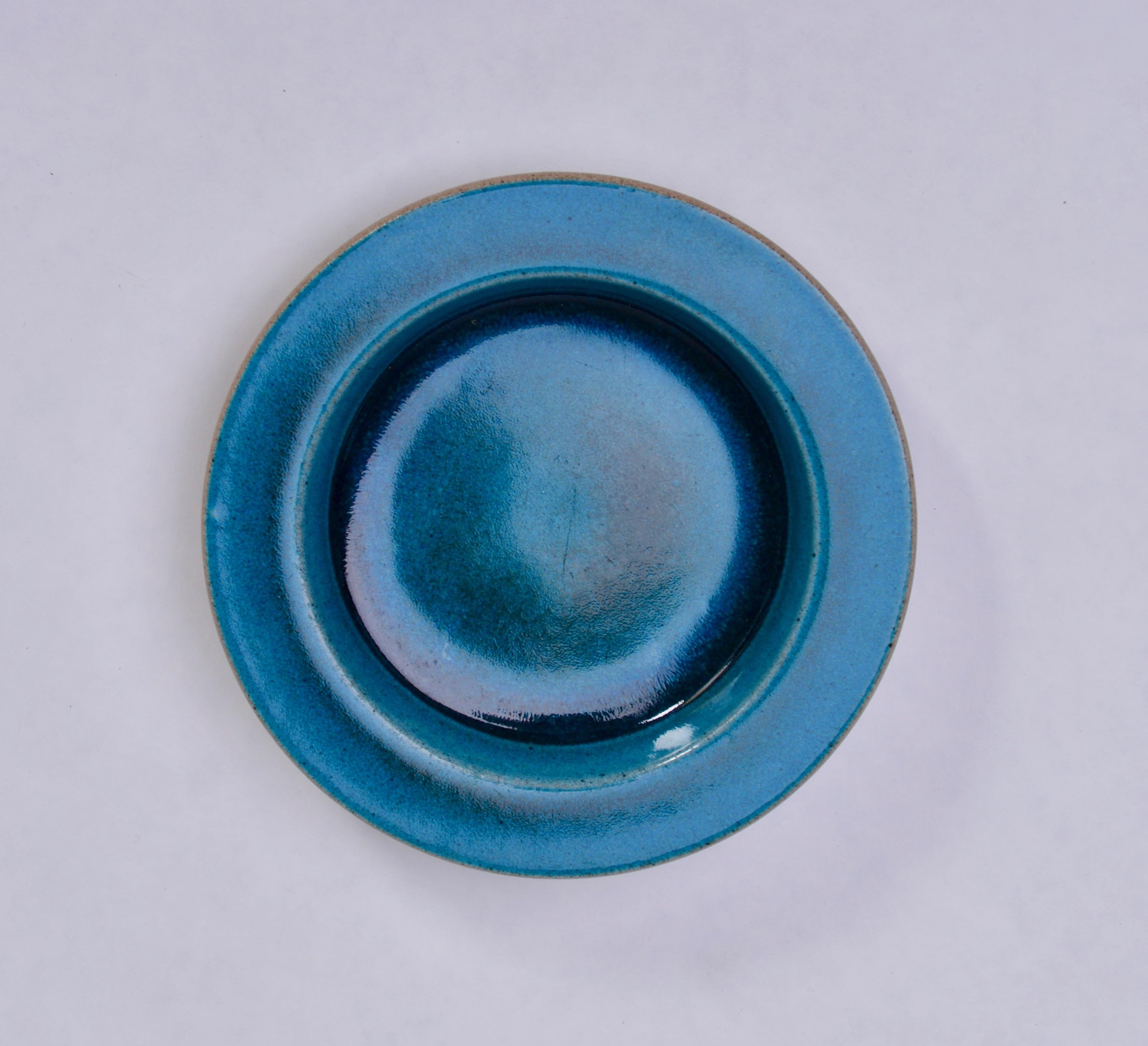 Blue Mid-Century Modern stoneware plate by Atelier Knabstrup
Stoneware plate with beautiful ceramic glazing in different tones of blue. Produced by Danish company Knabstrup Atelier.