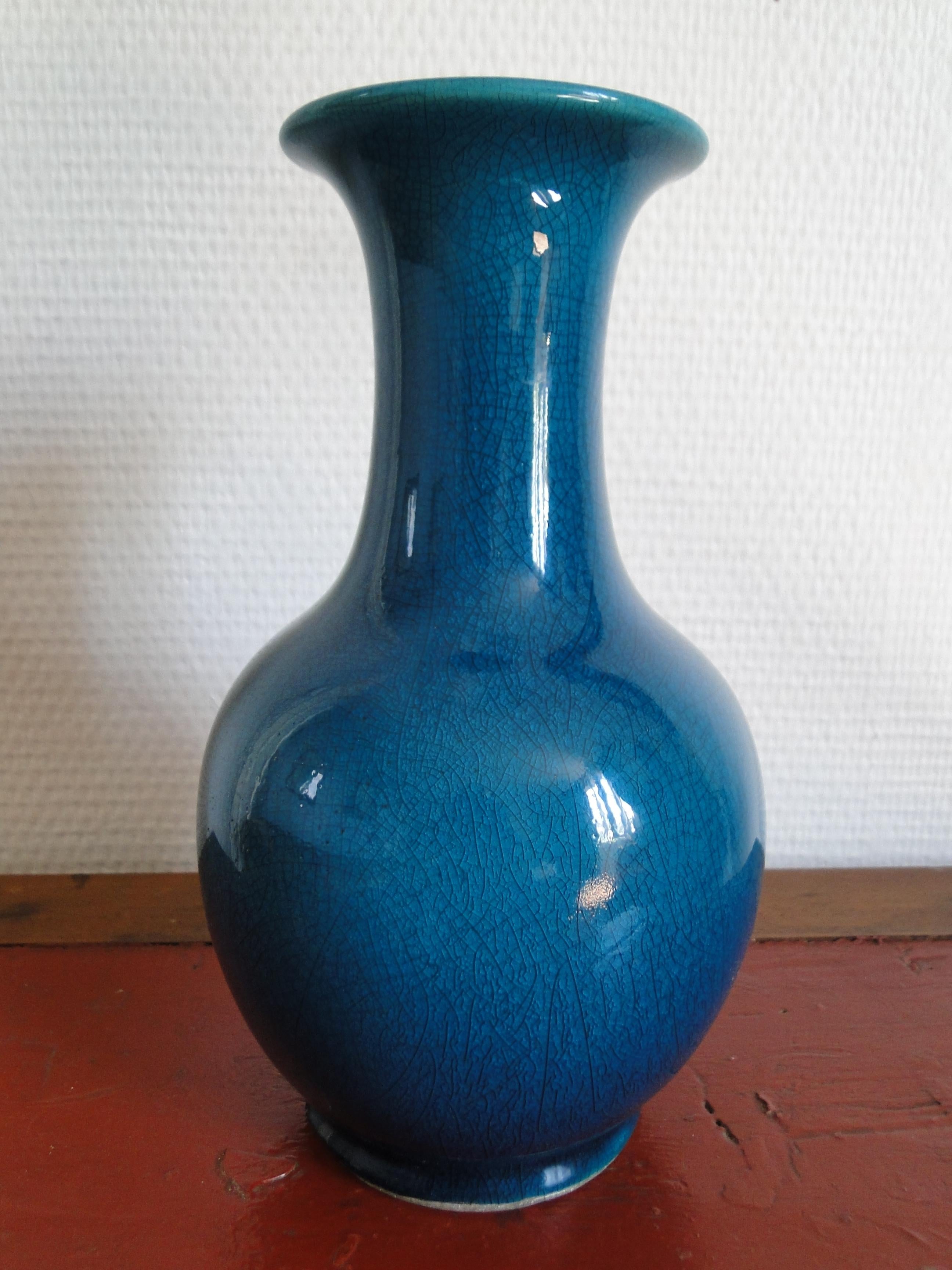 Pol Chambost

Made in France, original blue midcentury ceramic vase by the french artist.
Dated and signed under the vase.
Very good condition.