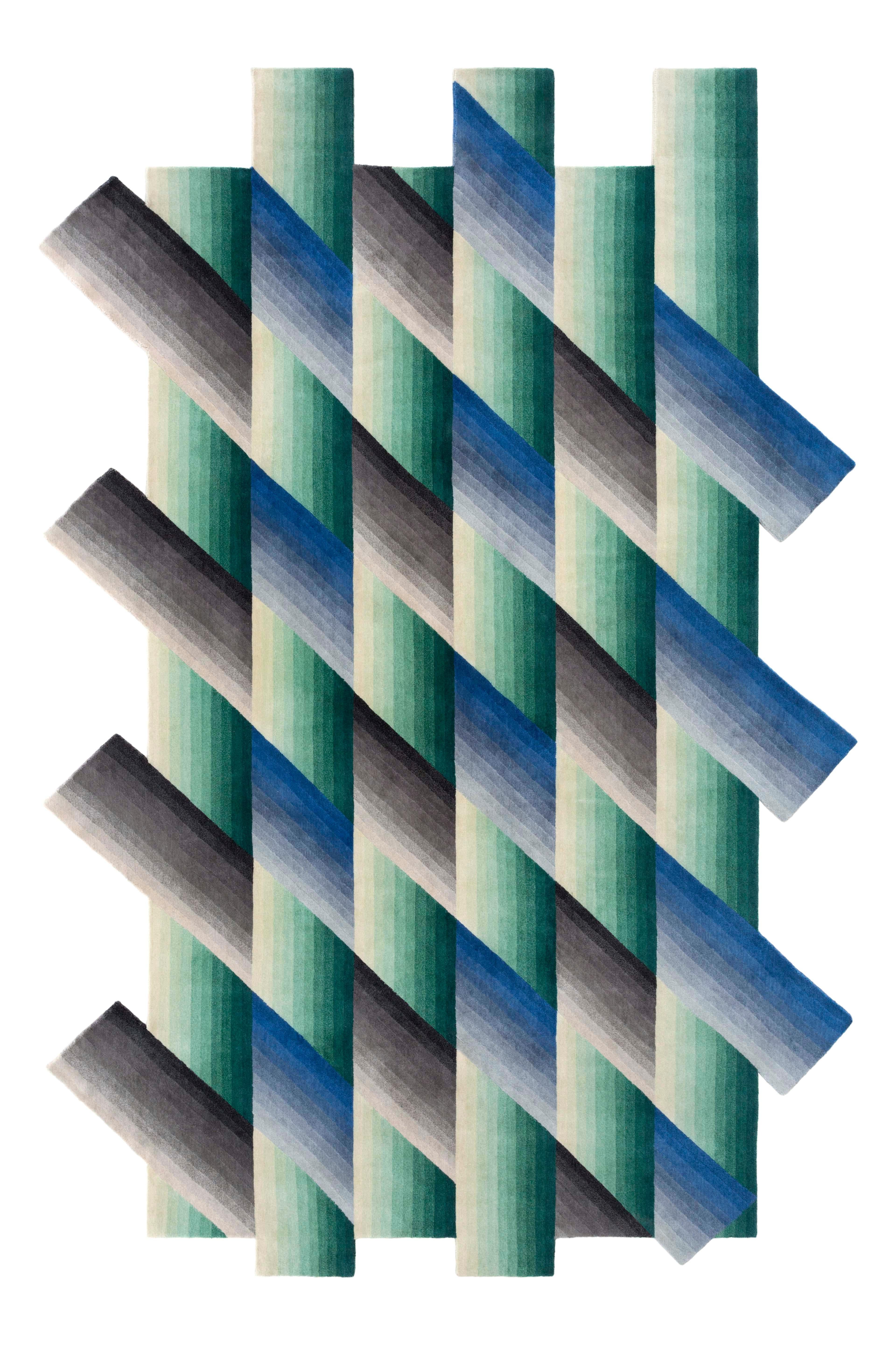 Blue Mirage Rug by Gandia Blasco
Design by Patricia Urquiola
Dimensions: W 200 x H 310 cm. 
Materials: Fiber composition: 100% wool. 
Weight: 18,4 kg

Passion for life outdoors, a dream come true on the edge of a cliff in the north of Ibiza. The