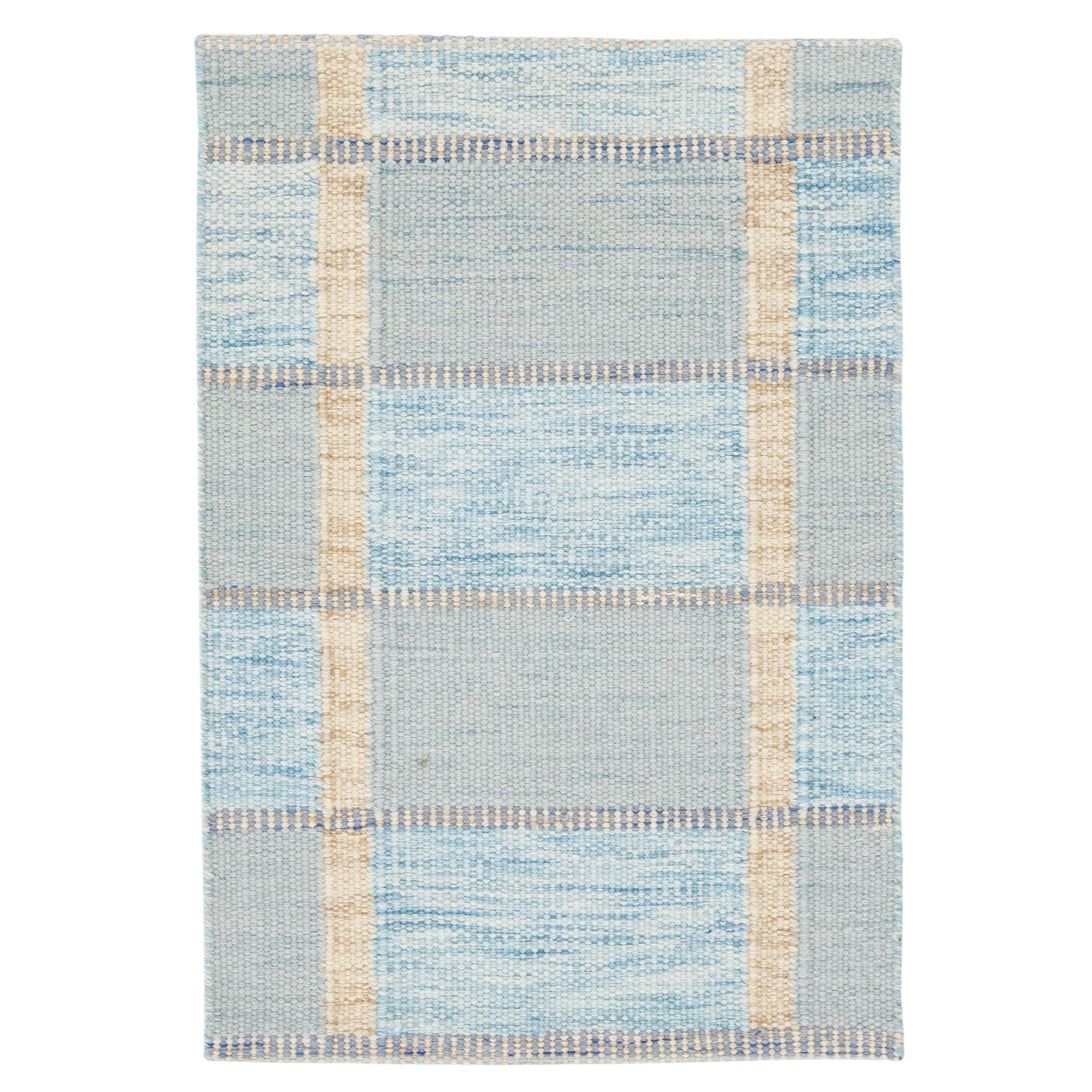 Tapis en laine bleu moderne fait à la main de style suédois sur mesure