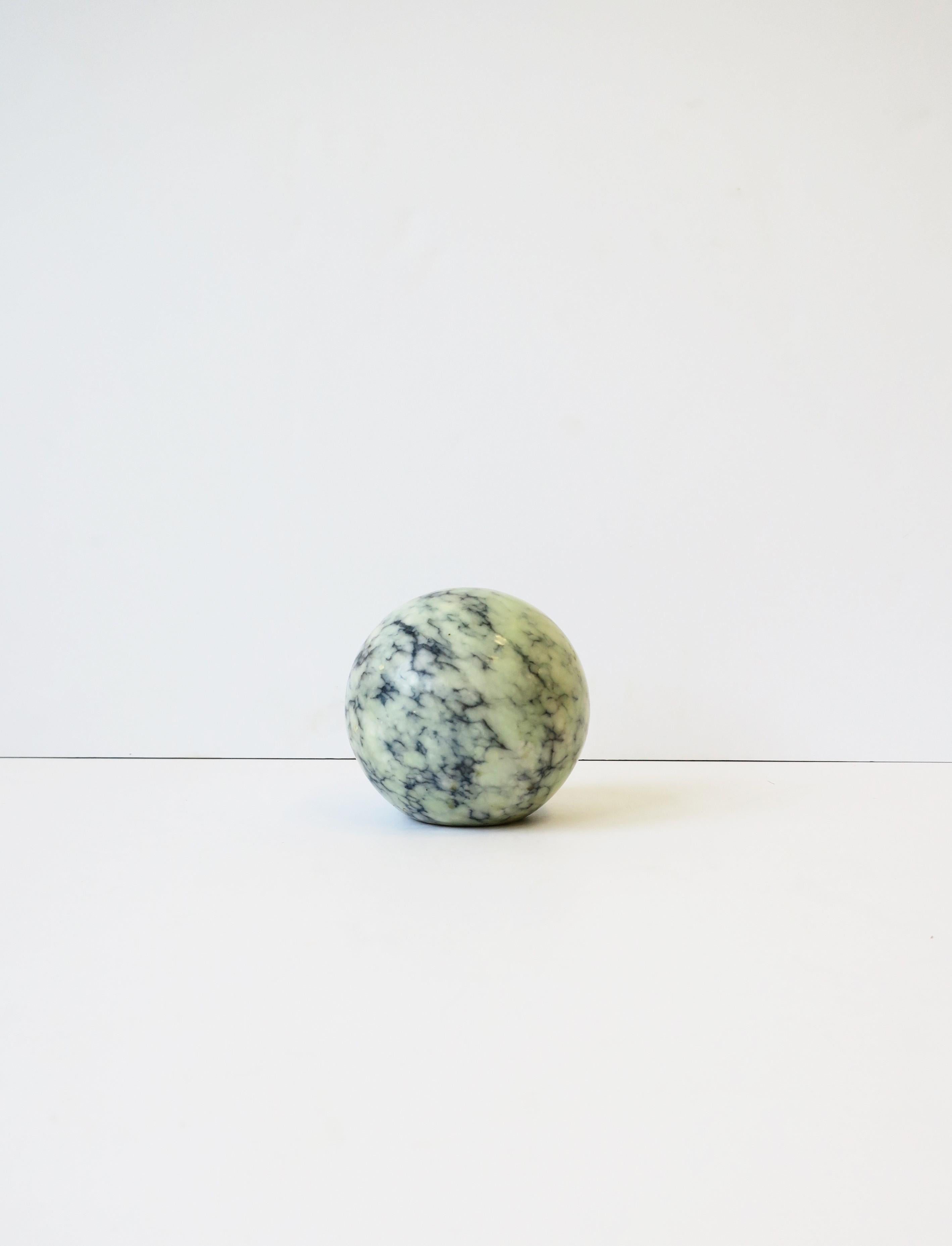 A substantial modern or Post-Modern marble round ball sphere in a light blue marble with dark blue veining, Italy, circa late-20th century, 1970s. A great decorative object as shown in images. Dimensions: 3.5