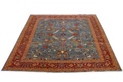 Tappeto in lana blu moderno in stile Serapi con motivo floreale alllover