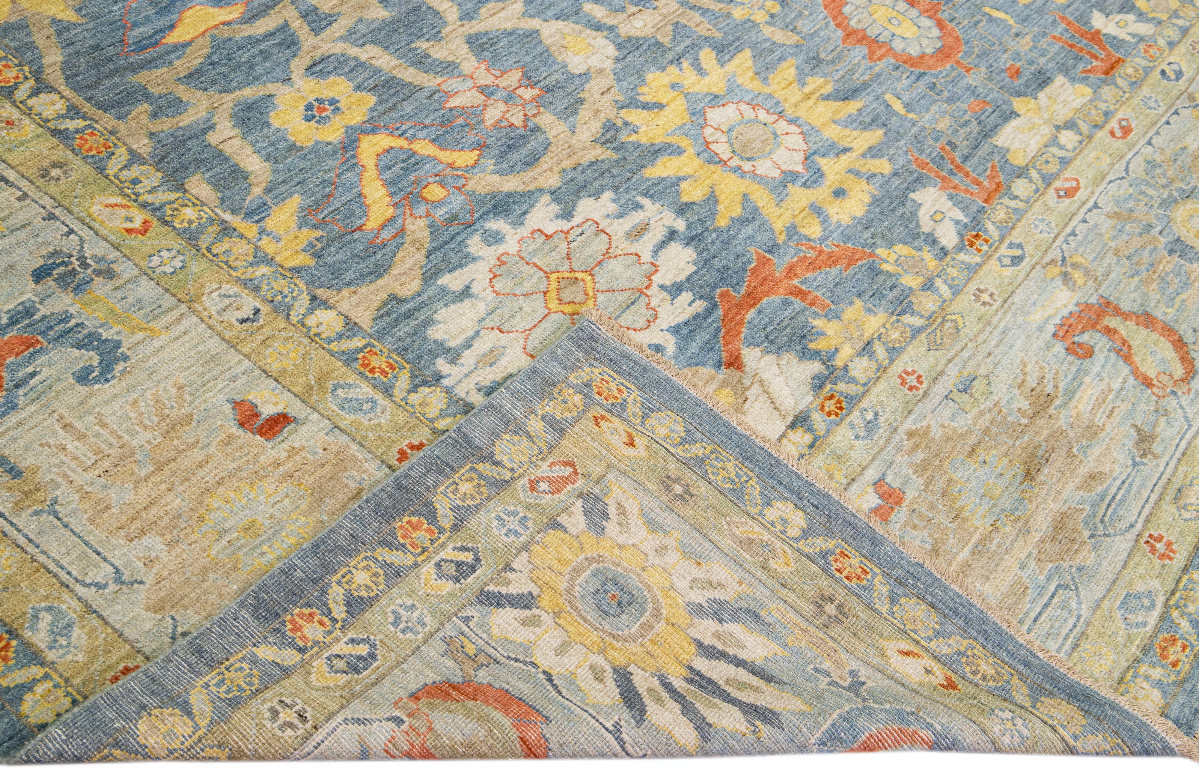 Beautiful modern Sultanabad hand-knotted wool rug with a blue field. This Sultanabad rug has a light blue frame and multicolor accents in a gorgeous all-over classic floral pattern design.

This rug measures: 13