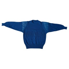 Jersey azul de lana y mohair con hombreras de piel - Made in Italy