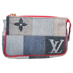 Blue monogram denim Louis Vuitton Micro Pochette pouch with zip closure