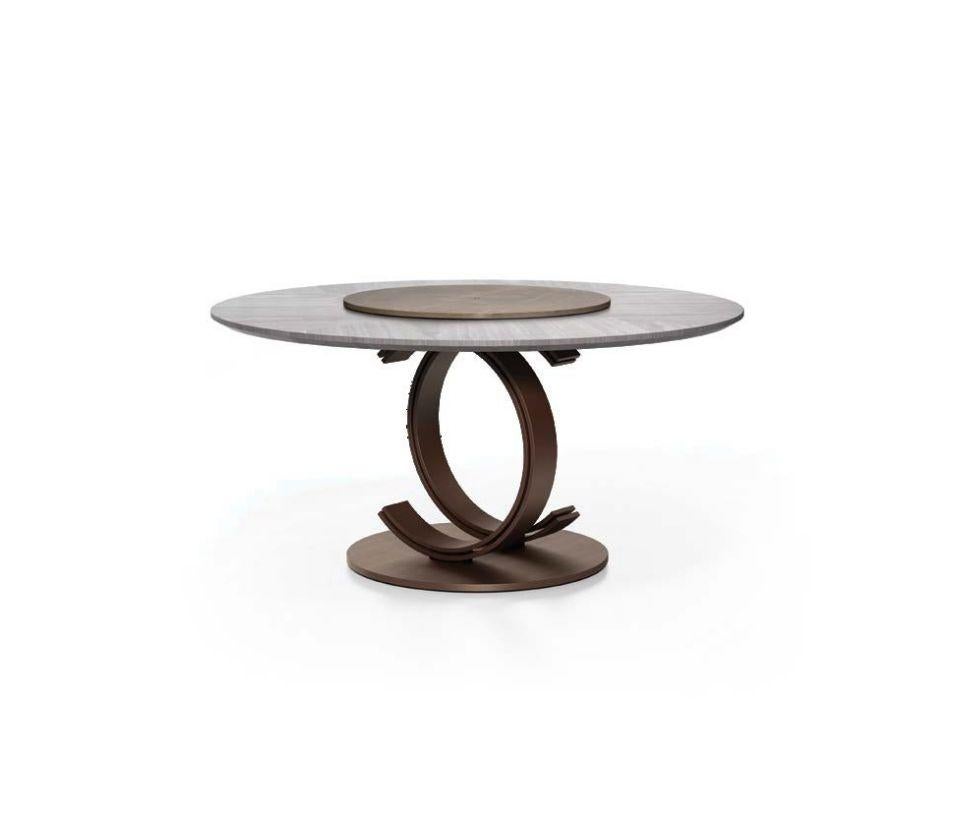 Dining table with veneer inlay top, metal base and marble lazy Susan.
B120 and B121

Materials: Metal base and wood top and lazy Susan marble
Dimensions:
Ø cm 160 x 077 H
in 63 x 30 H.
 