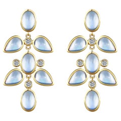 Boucles d'oreilles pendantes en or jaune 14k avec pierres de lune bleues et diamants
