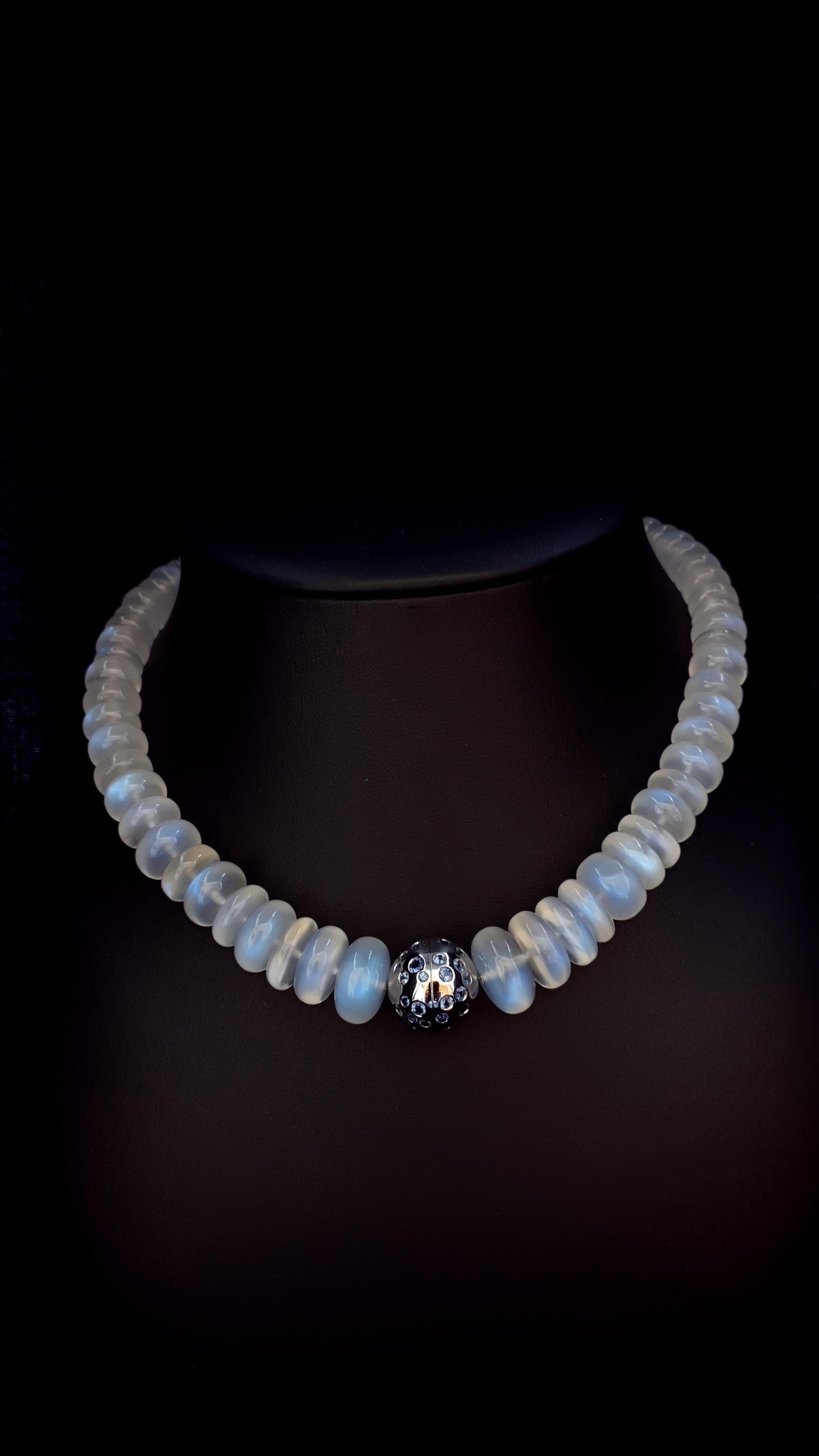 This Natural Blue Moonstone Rondel Beaded Necklace with 18 Carat White Gold Sapphire clasp is totally handmade. Cutting as well as goldwork are made in German quality. The screw clasp is easy to handle and very secure. 
Timeless and classic design