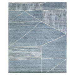 Tappeto moderno in lana blu in stile marocchino con motivo geometrico di Apadana