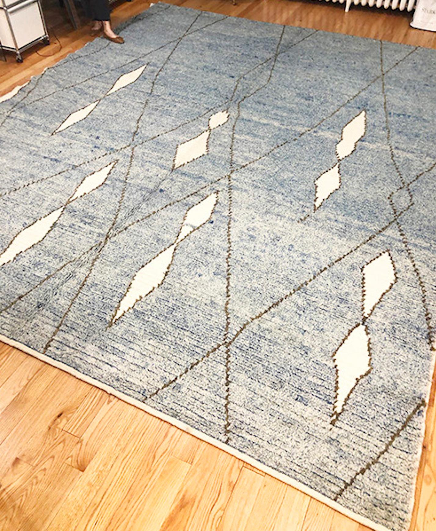 Orgin: Afghanistan
Dimensions: 13’3? x 11'
Age: 1950’s
Design: Moroccan
Material: 100% Wool-pile
Color: Robin’s Egg Blue, Off-White

11575

The early adoption of rug-making by native Moroccans is certainly due in large part to the