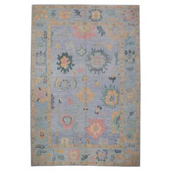 Blauer, mehrfarbiger, handgewebter Oushak-Teppich aus Wolle mit Blumenmuster 10'4" X 14'2"