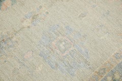 Tapis turc Oushak en laine tissé à la main à motifs floraux multicolores bleu 4'11 po. x 7'1 po.