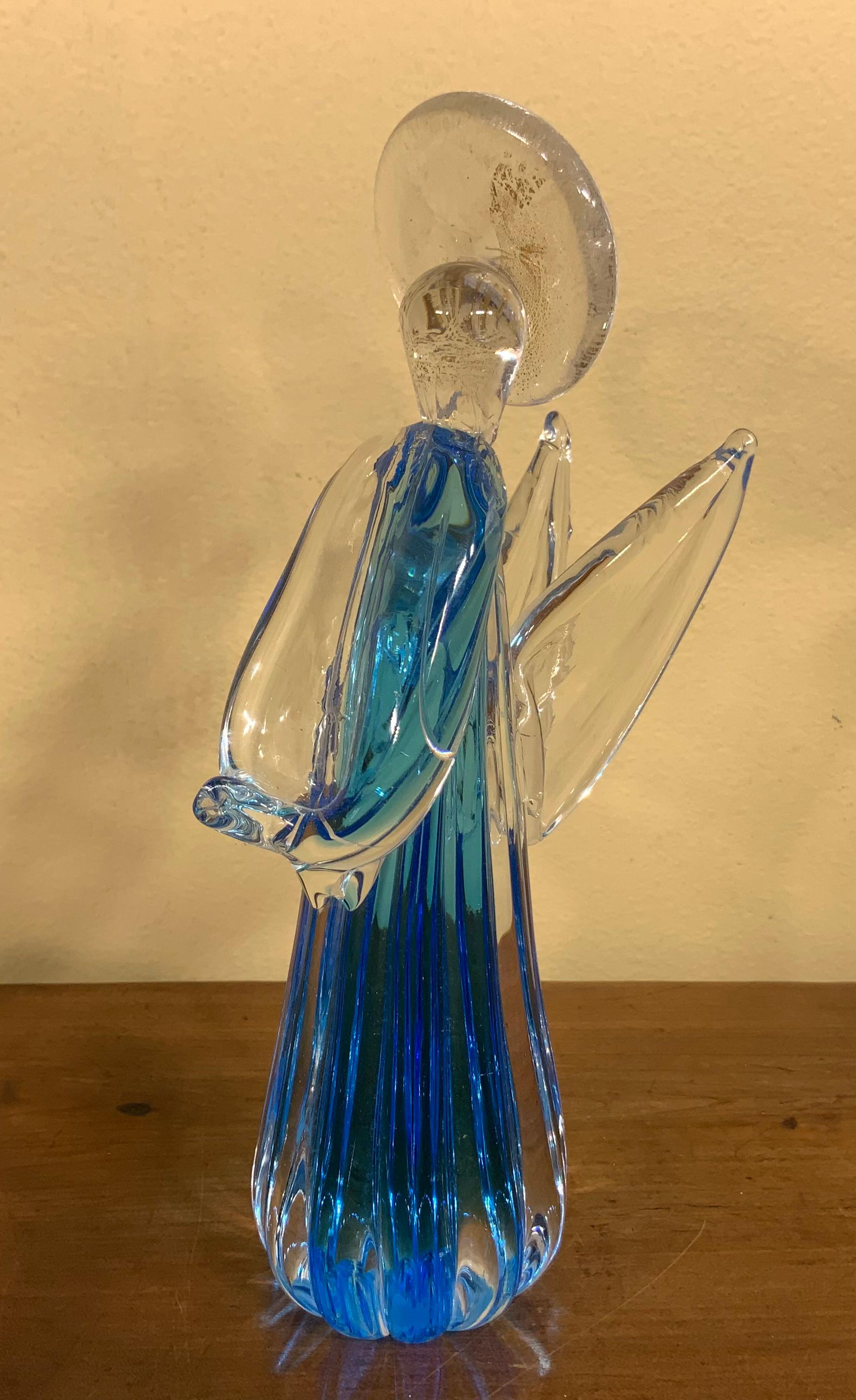 Beautiful vintage Murano hand blown Italian art glass angel figurine sculpture. It has beautiful gold frosted halo, exceptional object of art for display.
 