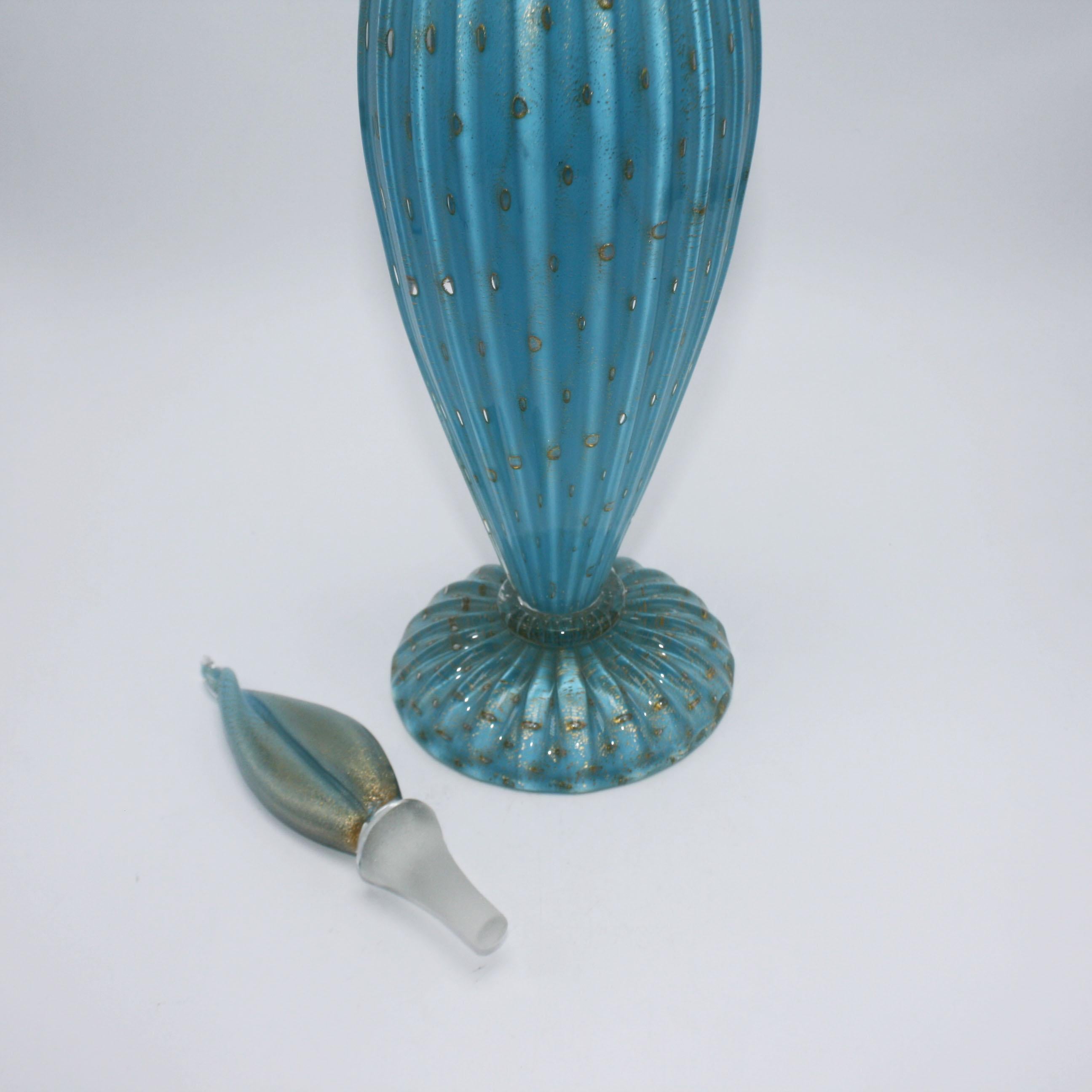 Blue Murano glass decanter with gold inclusions, circa 1950.