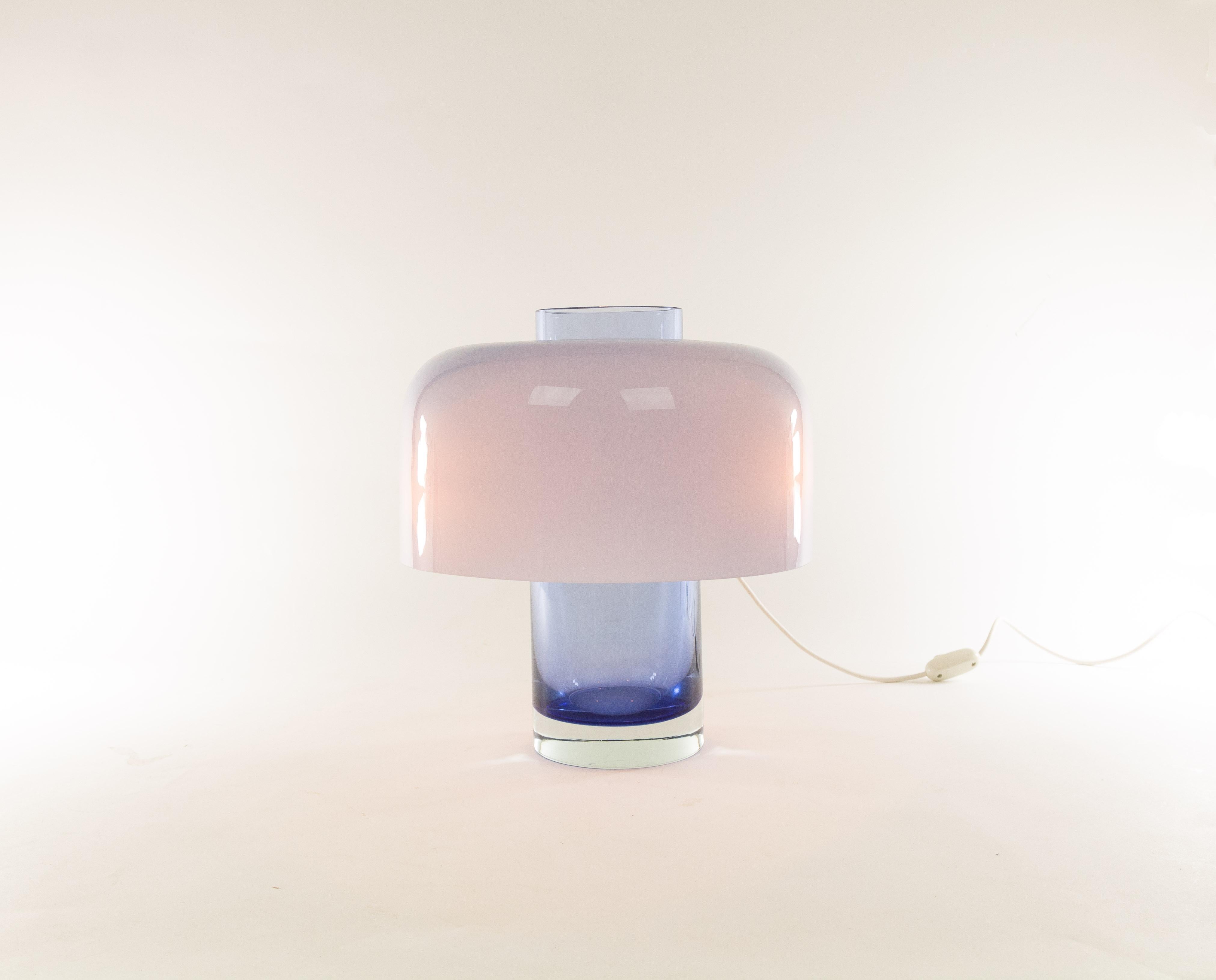 Blue Murano glass table lamp LT 226 designed by Carlo Nason and manufactured in the 1960s by Murano glassmaker A.V. Mazzega.

The blue base of the lamp can, as described in A.V. Mazzega, Catalogue No. 9, also be used as a vase.

The condition of