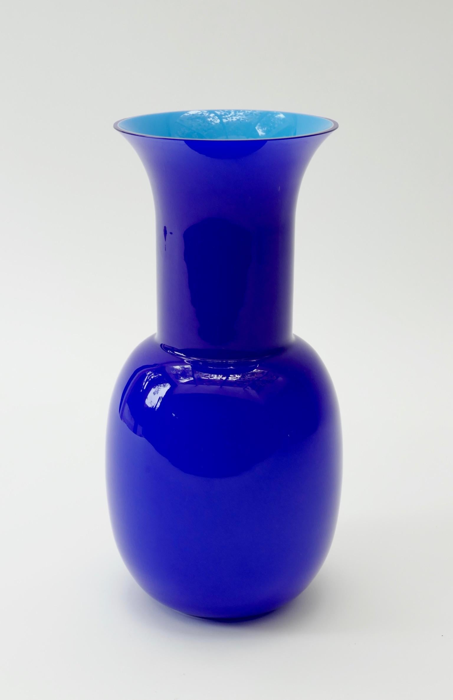 Large blue glass vase with a turquoise interior, made in Italy in 2000 and signed Aureliano Toso on the bottom. 
 