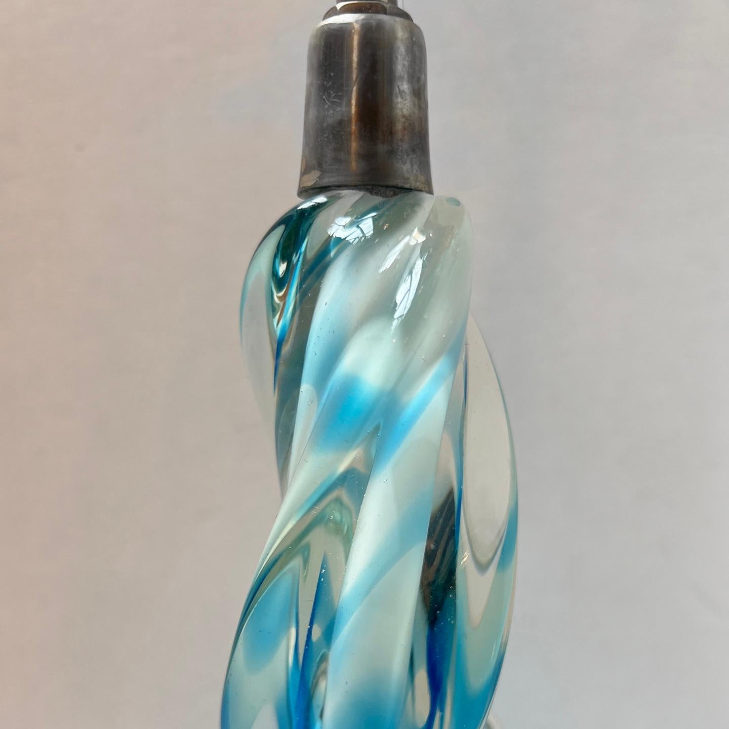 A circa 1920's Italian blue and white Murano glass lamp.

Measurements:
Height of body: 12.5