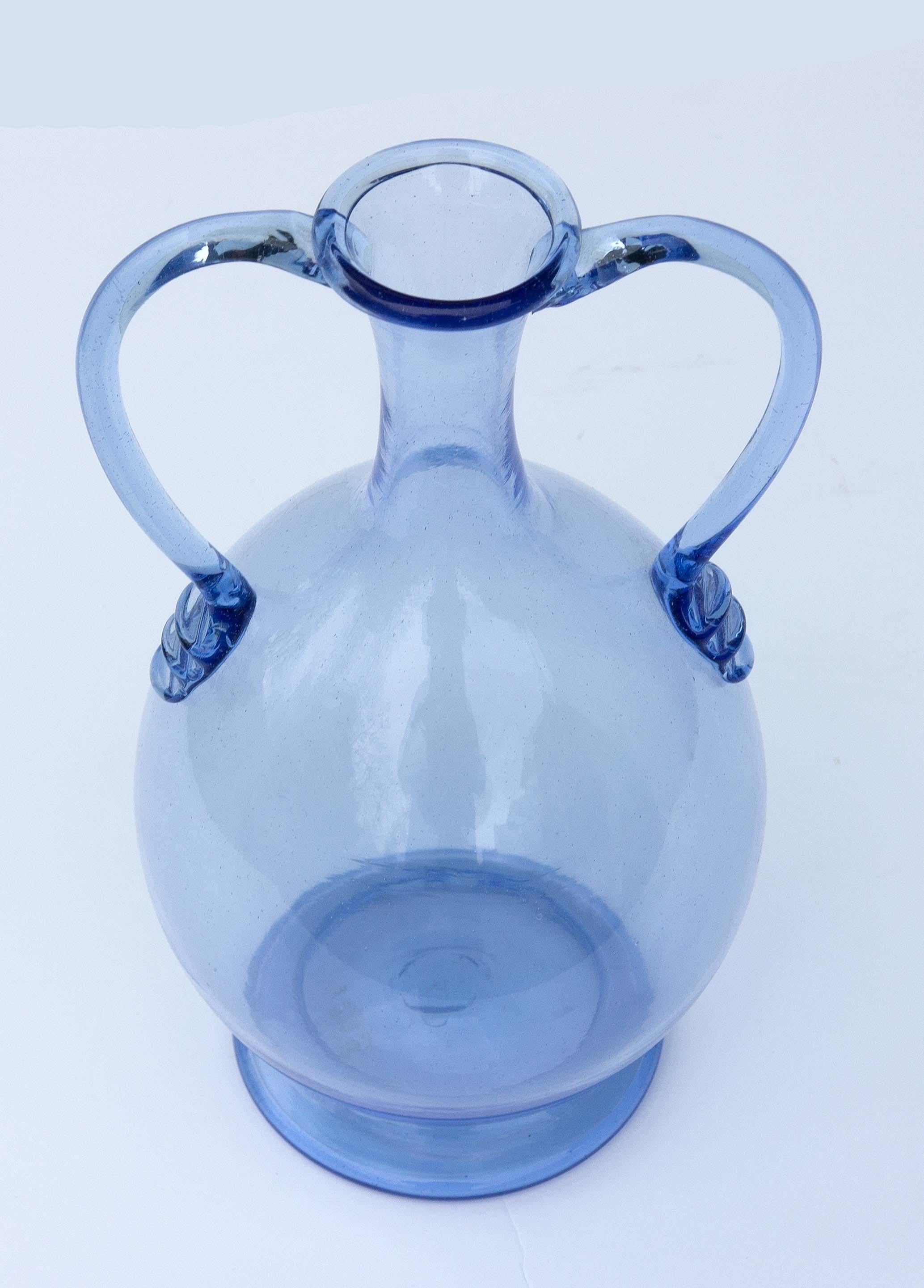 Murano blown glass vase with applied handles. Light blue. Attributed to Salviati.