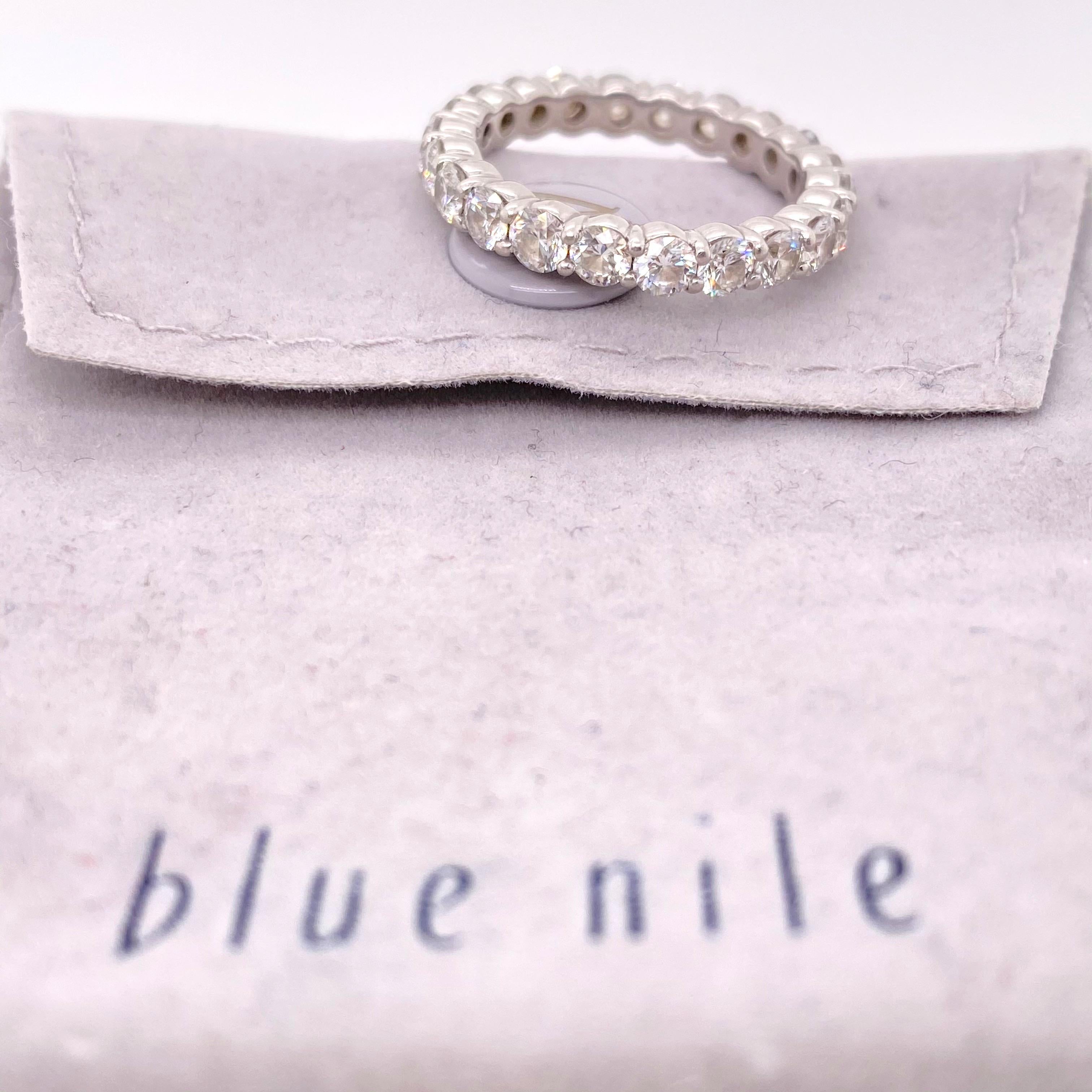 Blue Nile Diamond Eternity Band
Style:  Full Circle
Ref. number:  #1264788
Metal:  Platinum
Size:  5.5 
Measurements:  2.8 MM
TCW:  2.07 tcw
Main Diamond:  22 Round Brilliant Diamonds
Color & Clarity:  H - VS2 
Hallmark:  SDIL PT950
Includes:  BLUE