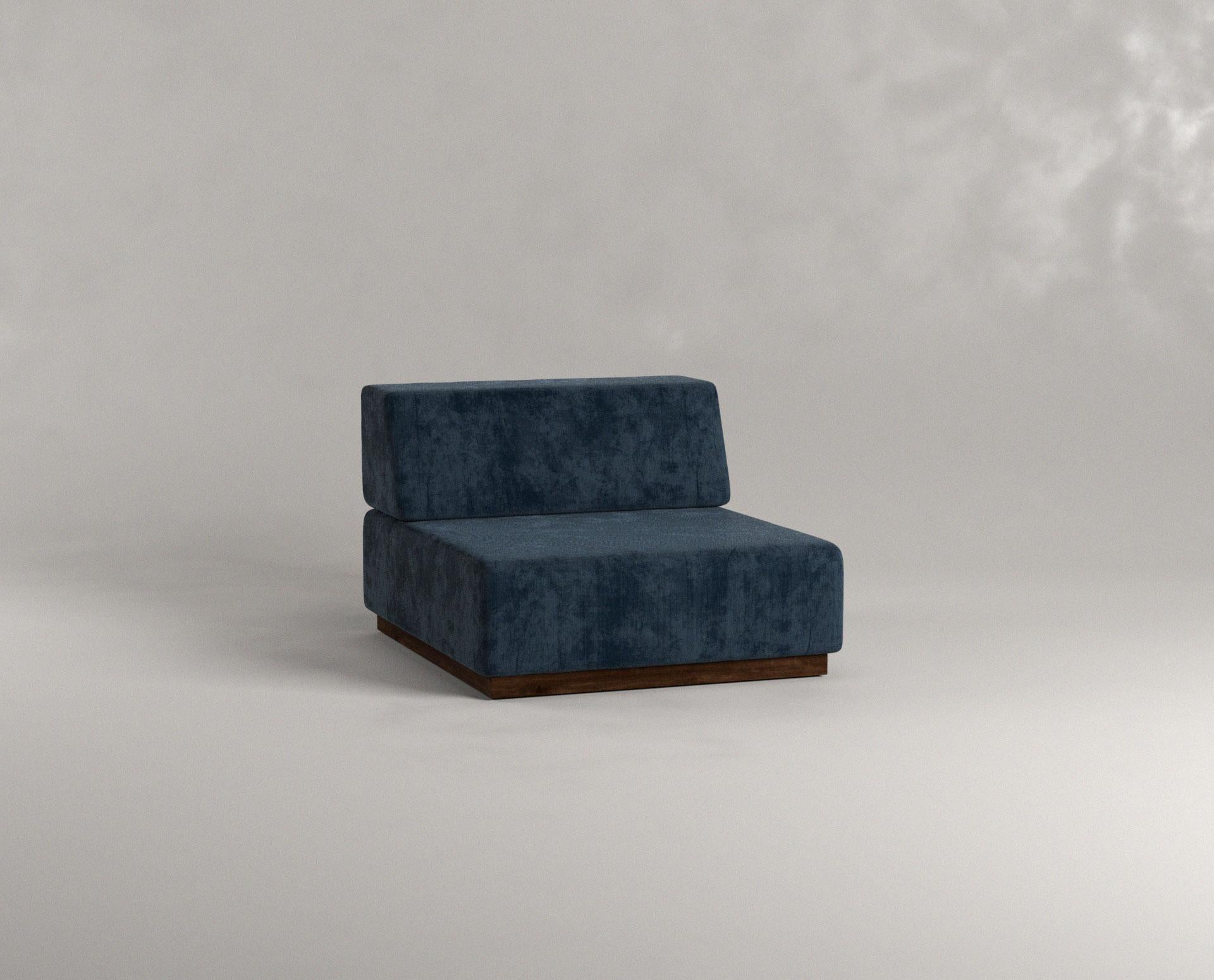 Blue Nube Lounger by Siete Studio
Dimensions: D100 x W80 x H60 cm.
Materials: Walnut, cushions, upholstery.

Characterised by its round edges and soft white cushions, Nube carries the comforting sensation of falling into a cloud.
The framework is
