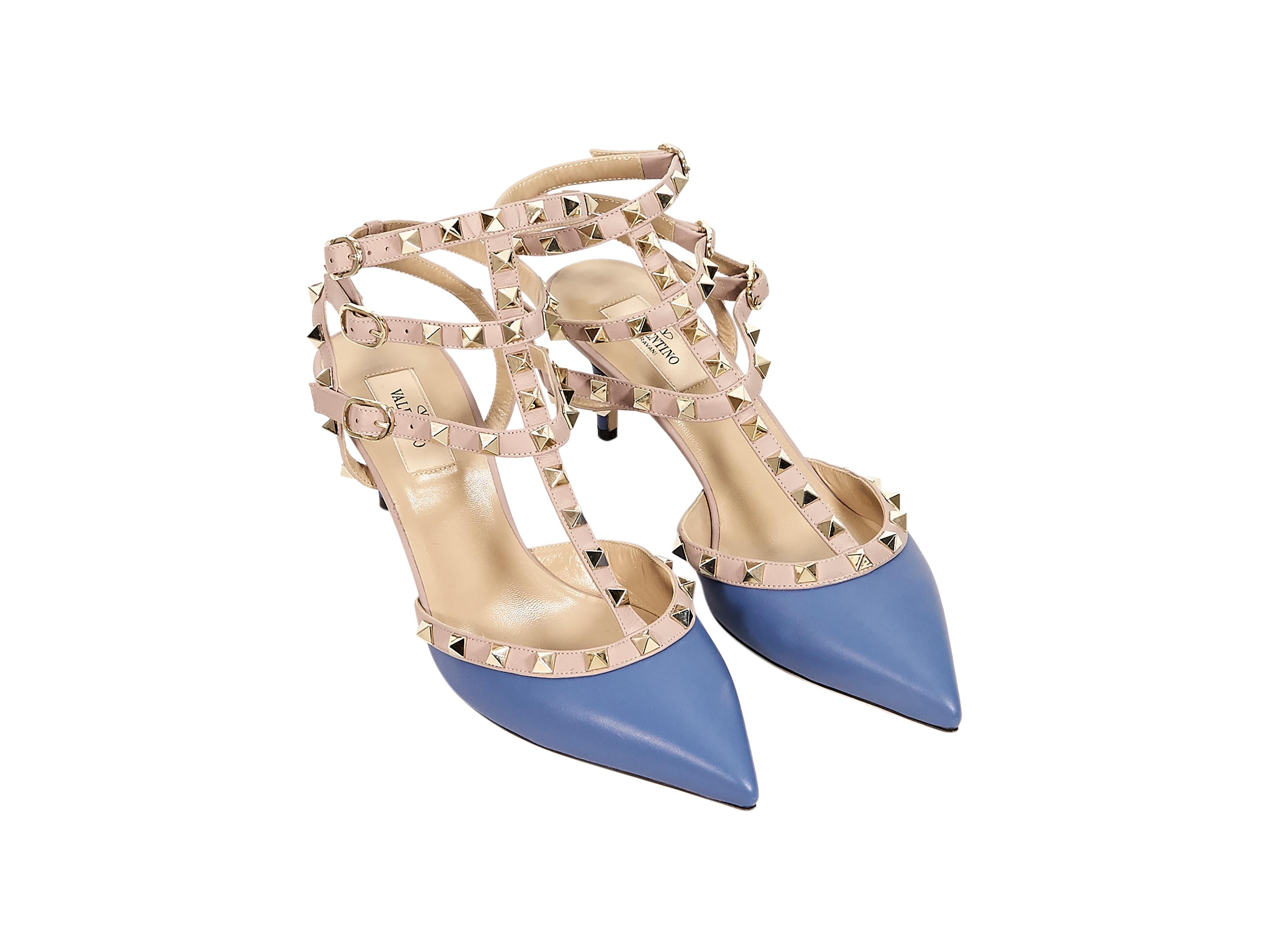 Product details:  Blue and nude leather Rockstud strappy kitten heels by Valentino.  Accented with pyramid studs.  Adjustable buckle straps.  Point toe.  Goldtone hardware.  2.5