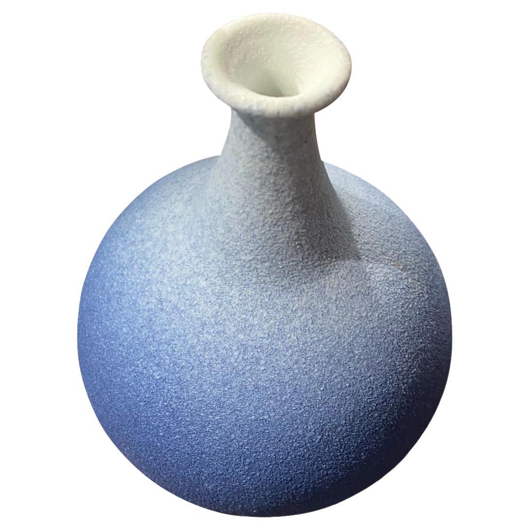 Contemporary Chinese ombre blue glazed vase.
Short squat shape.
Part of a large collection.