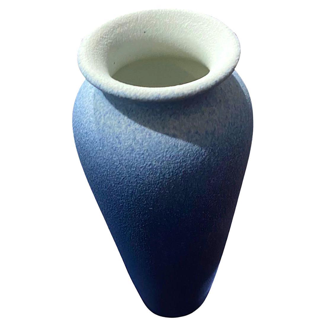 Contemporary Chinese ombre blue glazed vase.
Tall rounded top with a wide spout opening.
Part of a large collection.